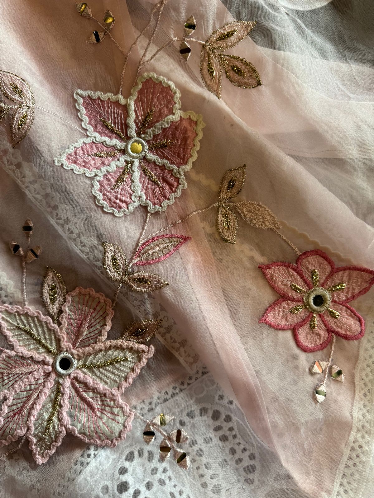 Soft organza unstitched suits with heavy crochia lace work detailings on the shirt