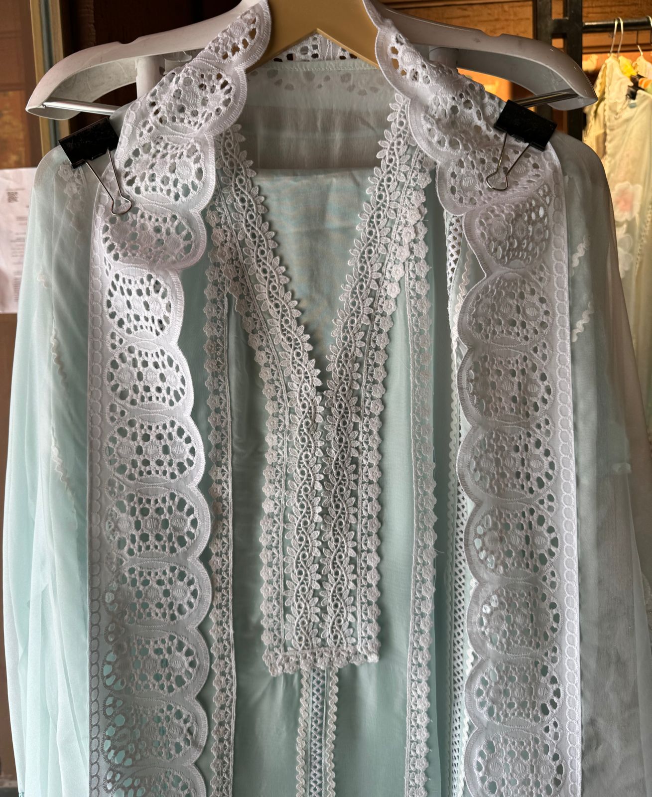 Soft organza unstitched suits with heavy crochia lace work detailings on the shirt