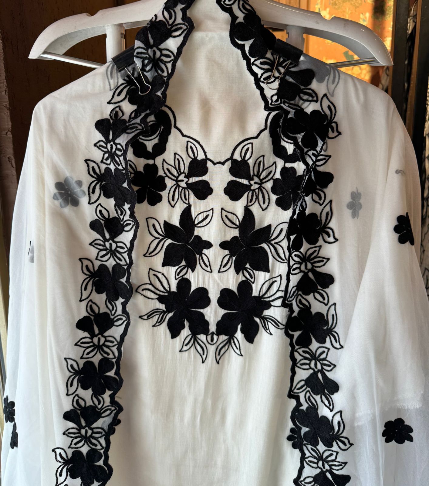 Soft cotton muslin shirt with thread embroidery done on the neckline