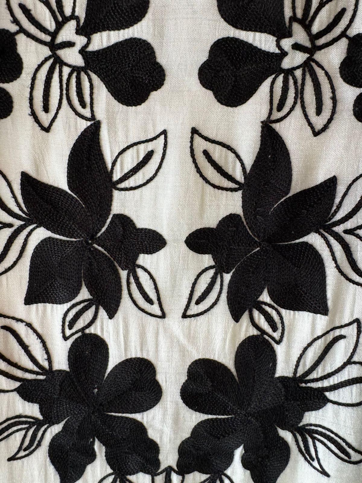 Soft cotton muslin shirt with thread embroidery done on the neckline