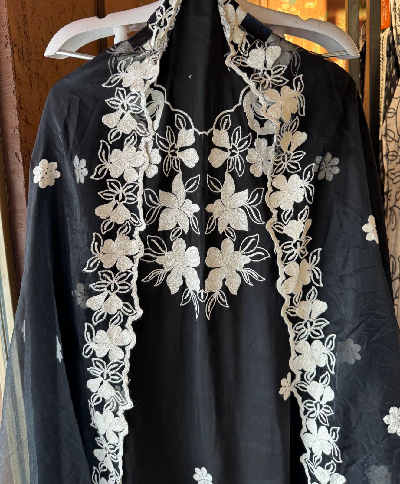 Soft cotton muslin shirt with thread embroidery done on the neckline