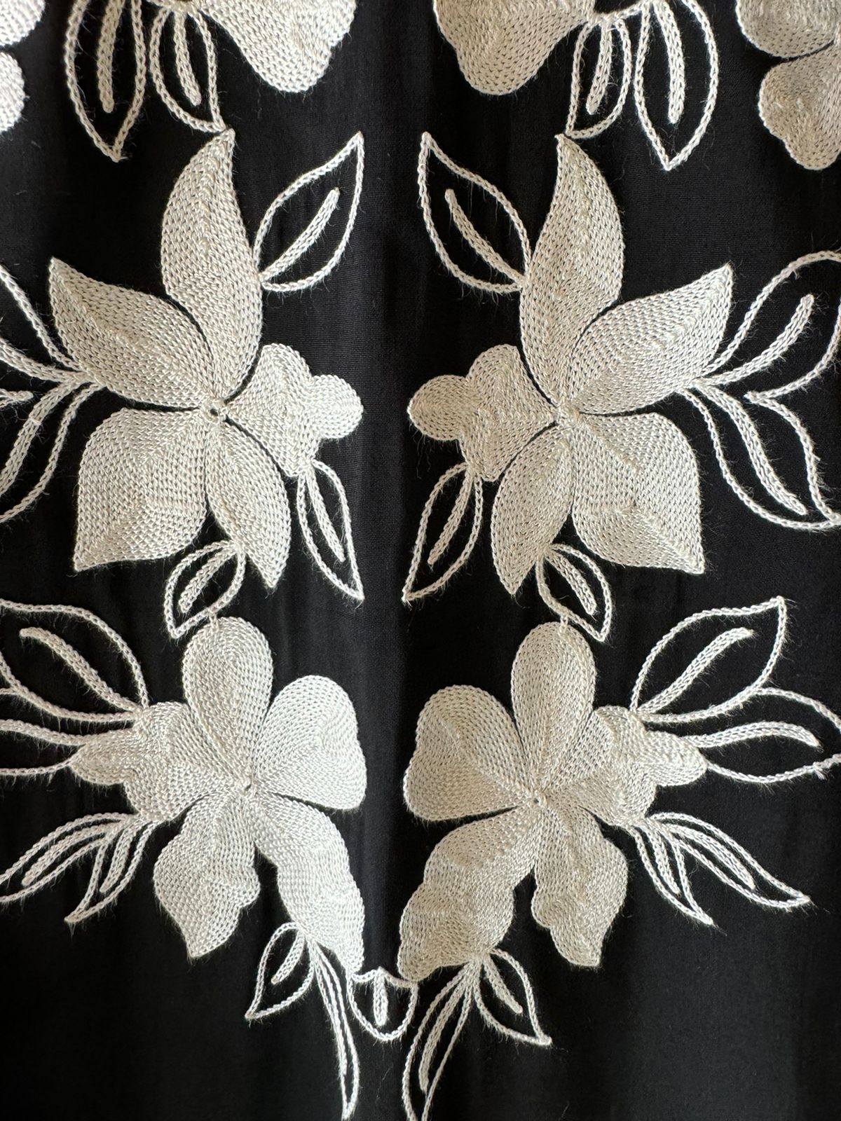 Soft cotton muslin shirt with thread embroidery done on the neckline