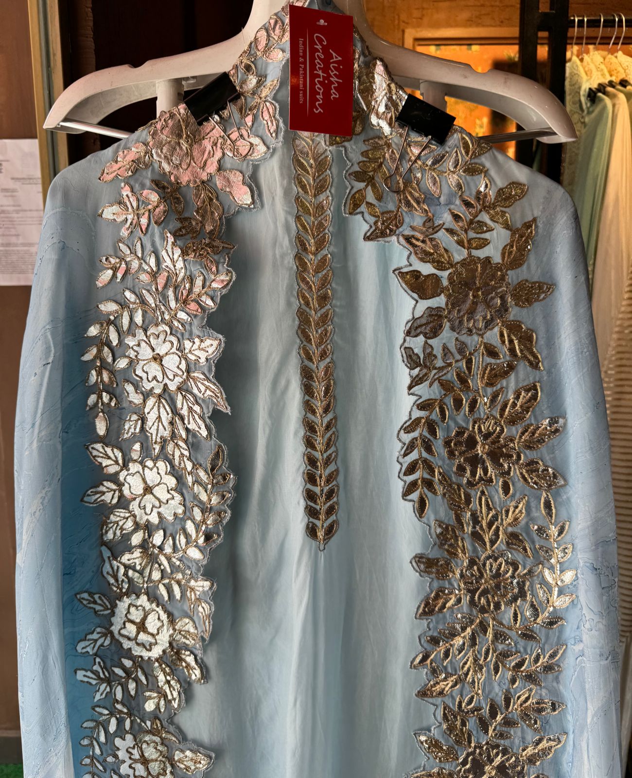 Plain shirt with neck Patti design and Cutwork done on the ghera of the shirt