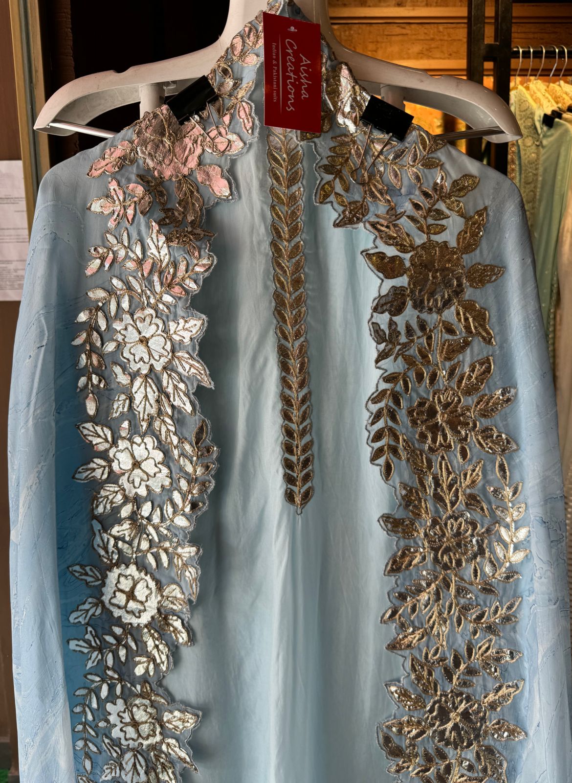 Plain shirt with neck Patti design and Cutwork done on the ghera of the shirt