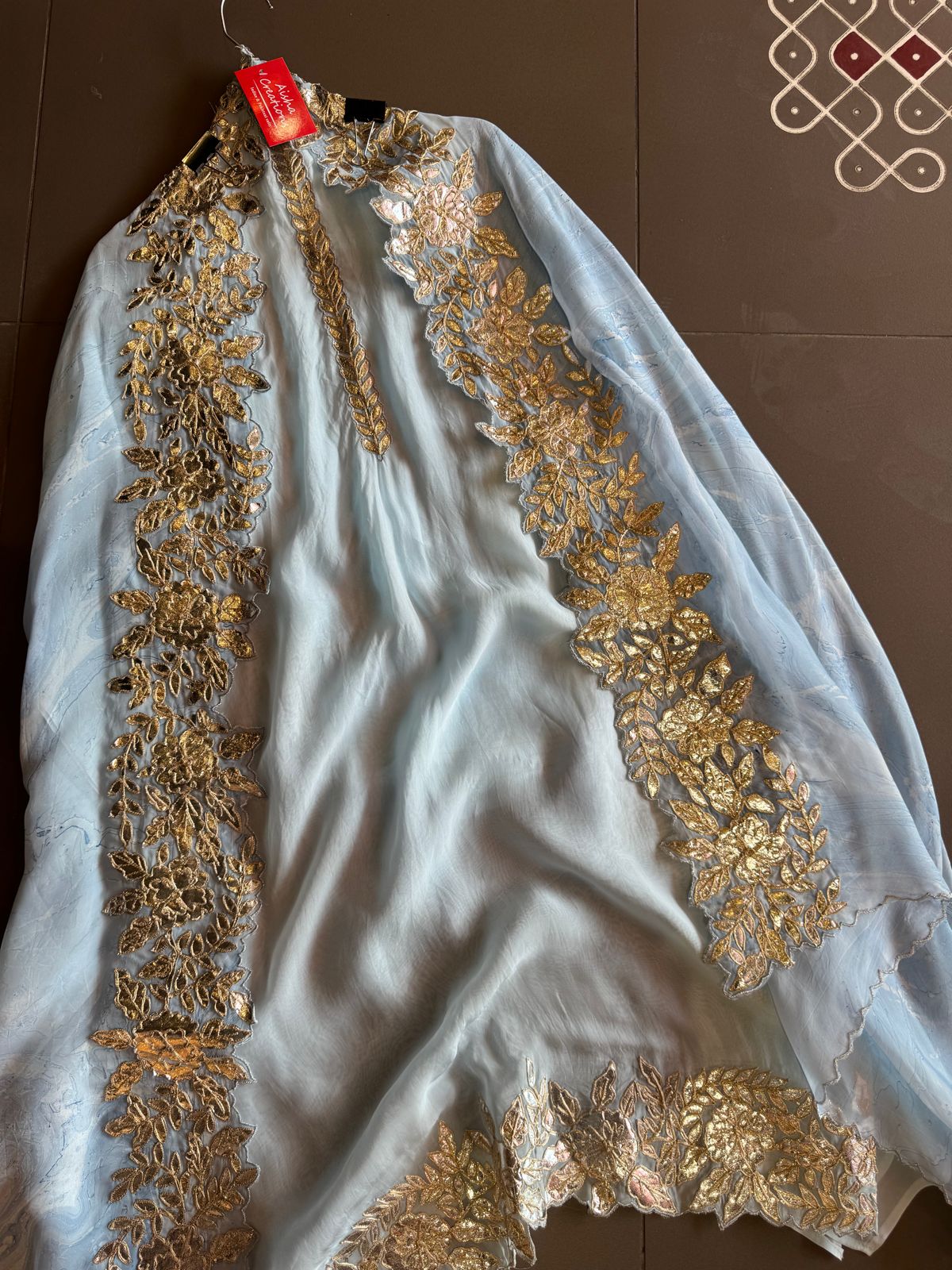 Plain shirt with neck Patti design and Cutwork done on the ghera of the shirt