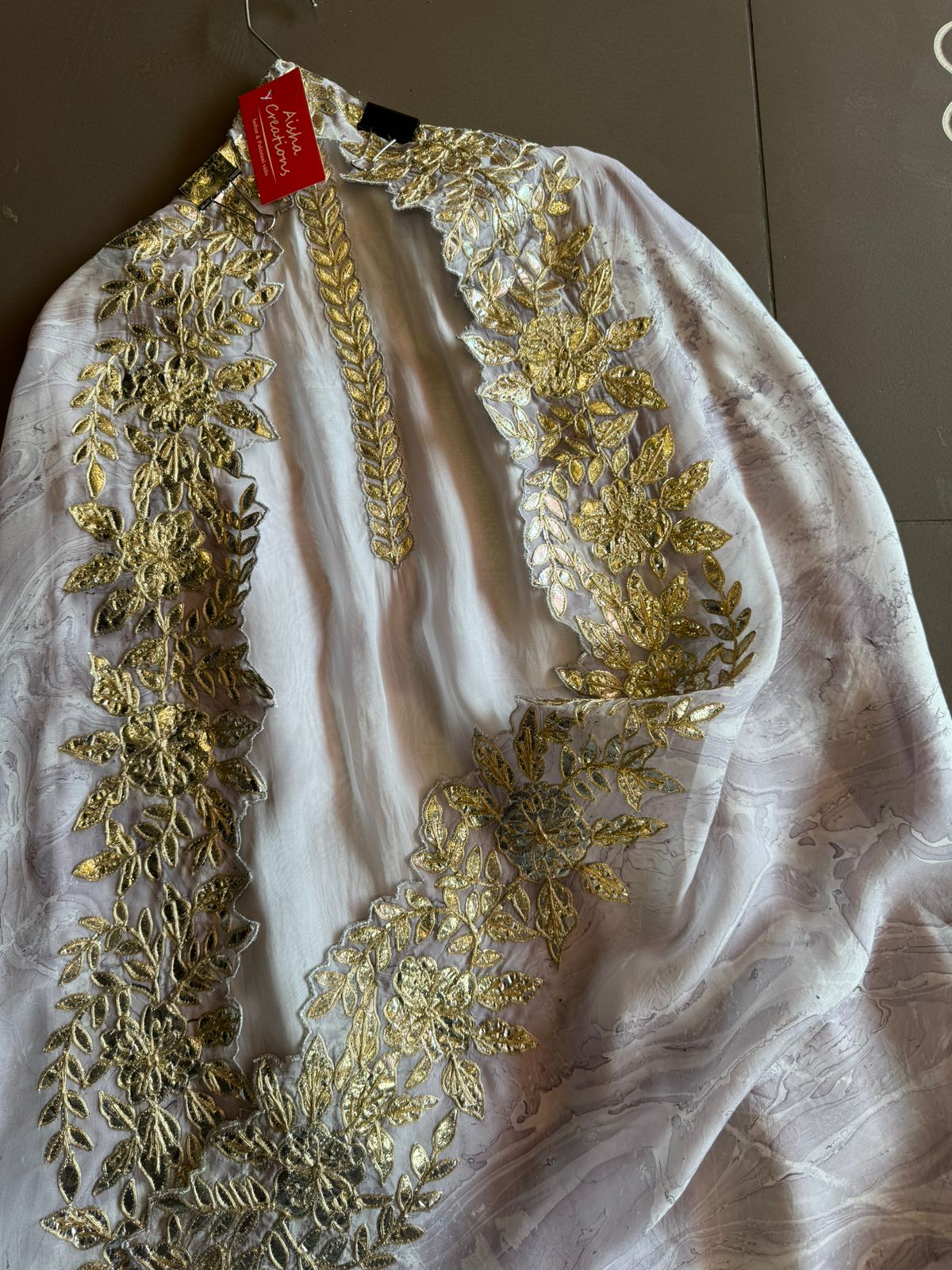 Plain shirt with neck Patti design and Cutwork done on the ghera of the shirt