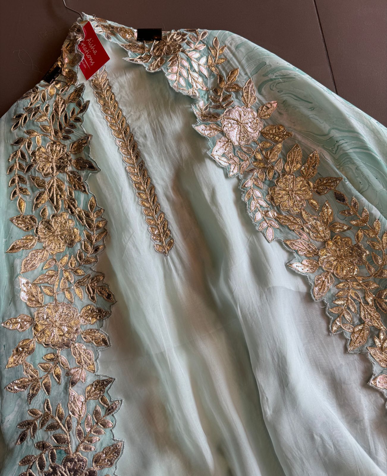 Plain shirt with neck Patti design and Cutwork done on the ghera of the shirt