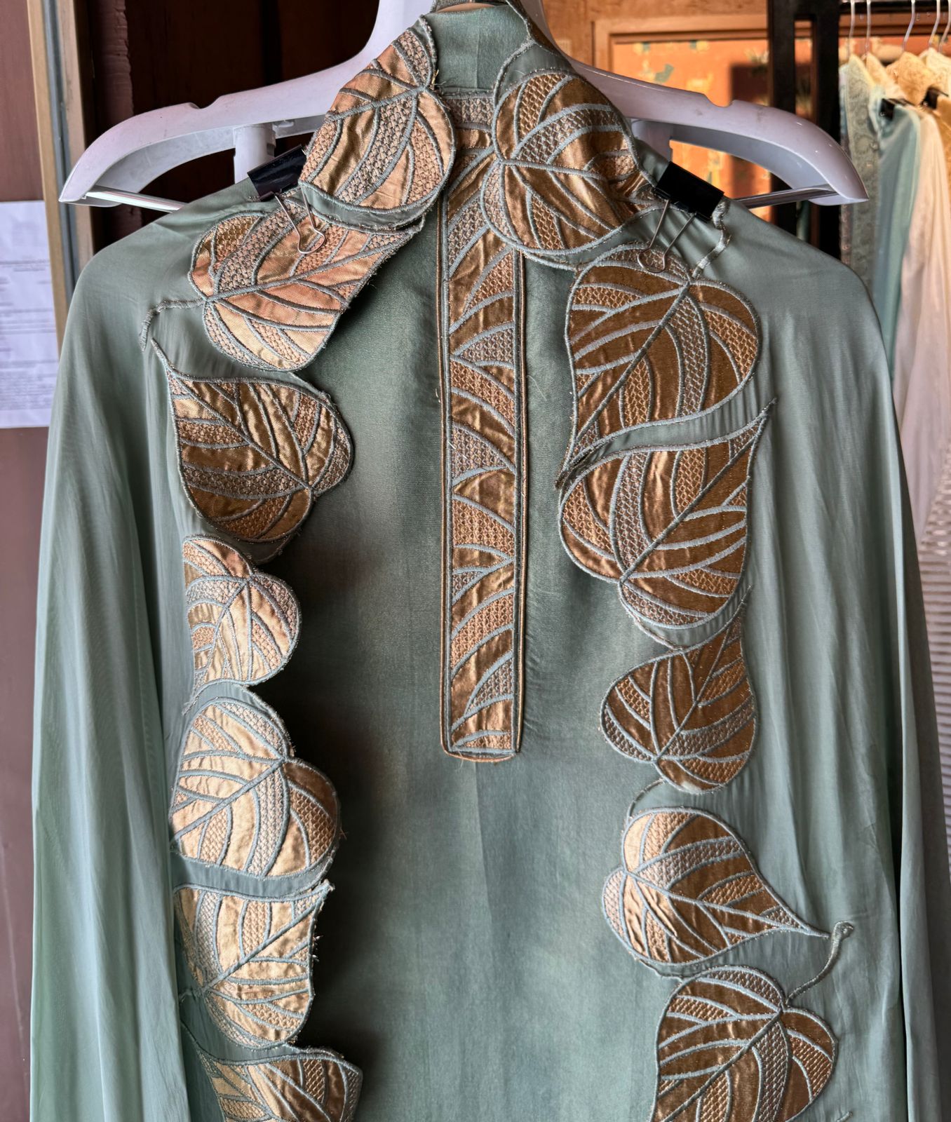 Soft tissue unstitched full size shirt with Leather work patti attached on the neckline