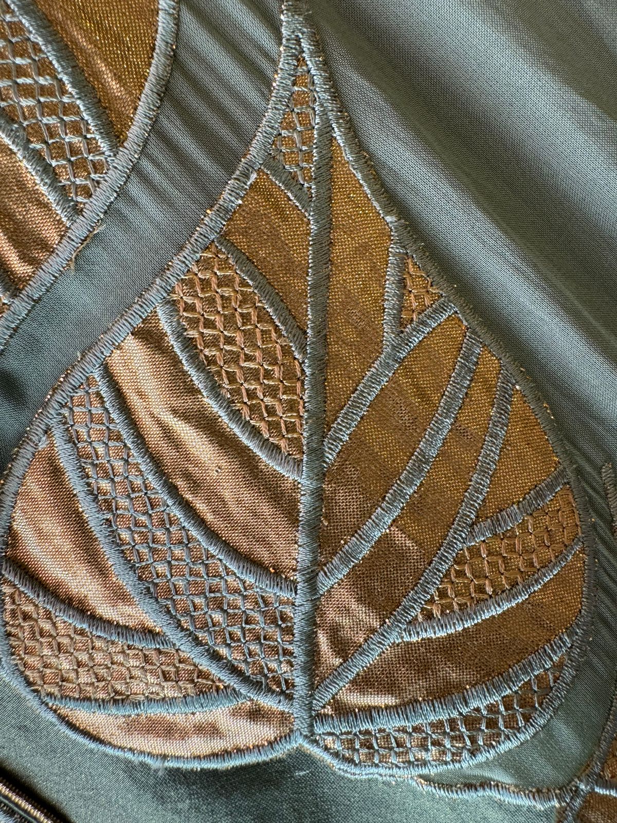 Soft tissue unstitched full size shirt with Leather work patti attached on the neckline