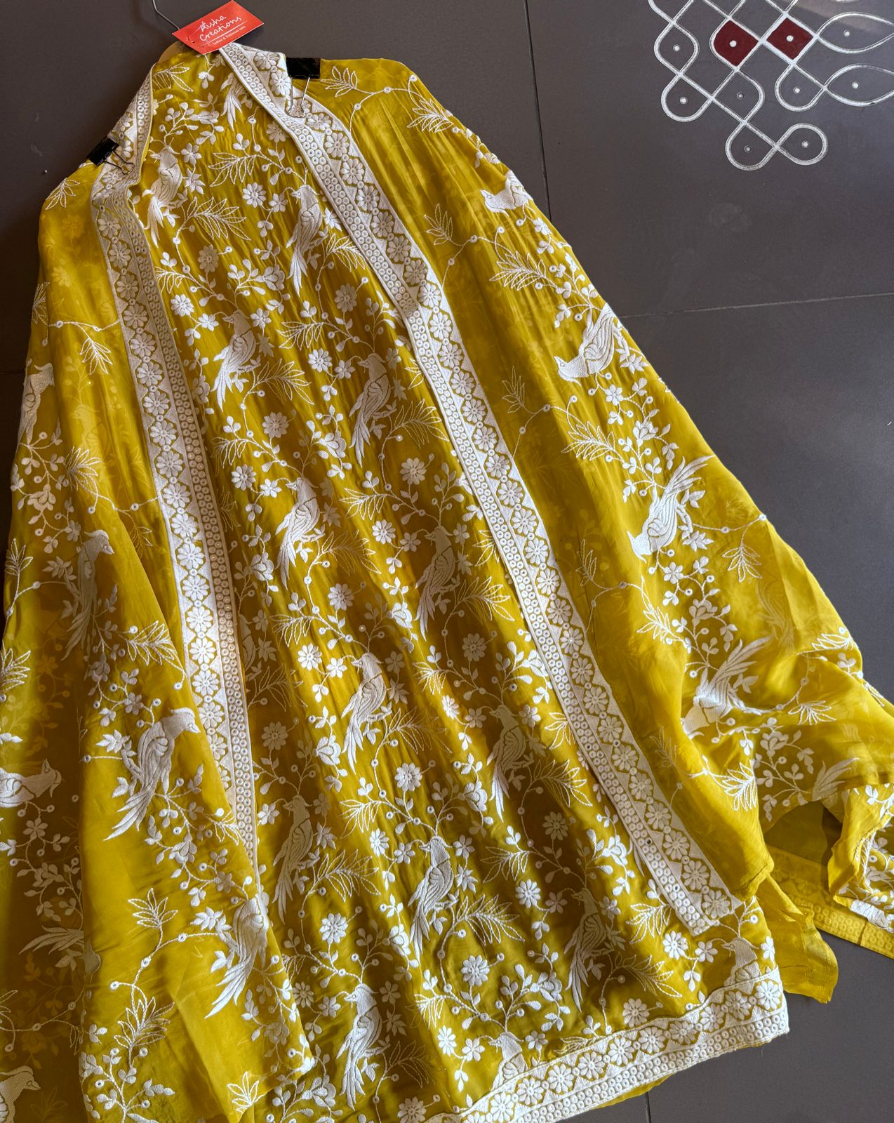 Very beautifully thread work done with sequence highlighting on the shirt front