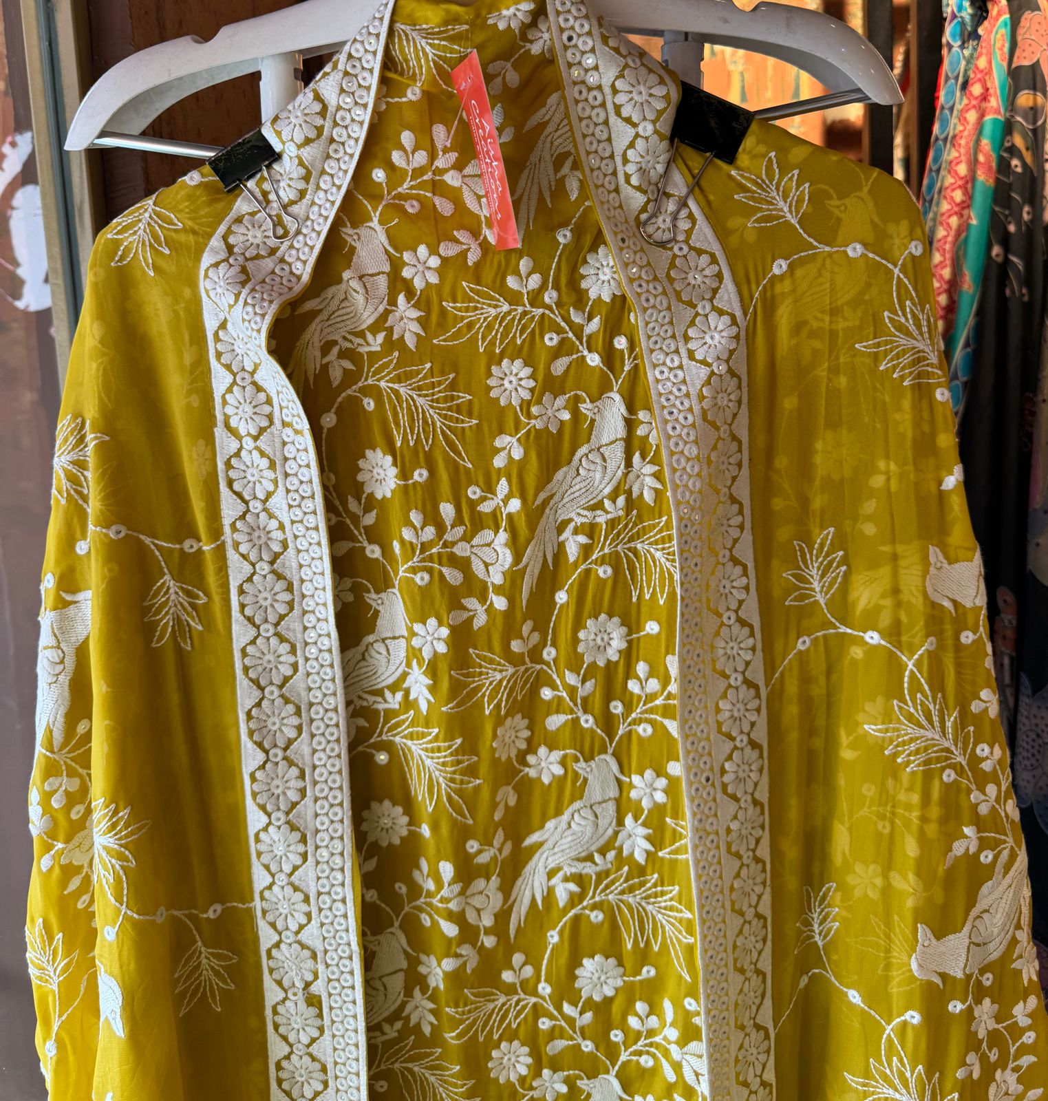 Very beautifully thread work done with sequence highlighting on the shirt front