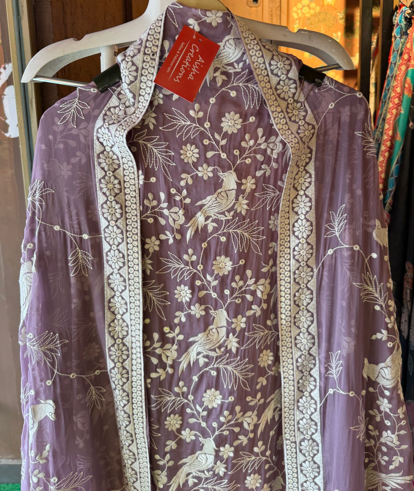 Very beautifully thread work done with sequence highlighting on the shirt front