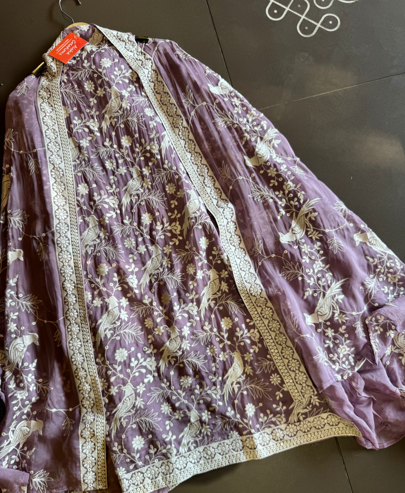 Very beautifully thread work done with sequence highlighting on the shirt front