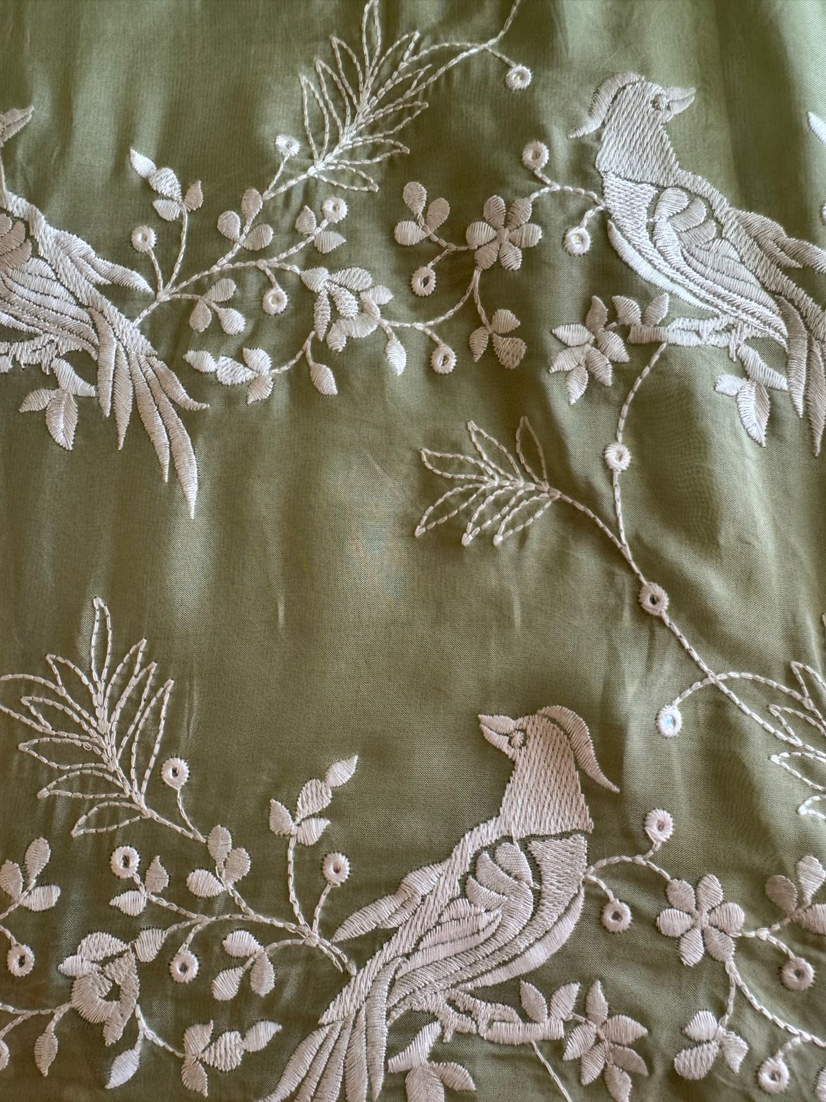 Very beautifully thread work done with sequence highlighting on the shirt front