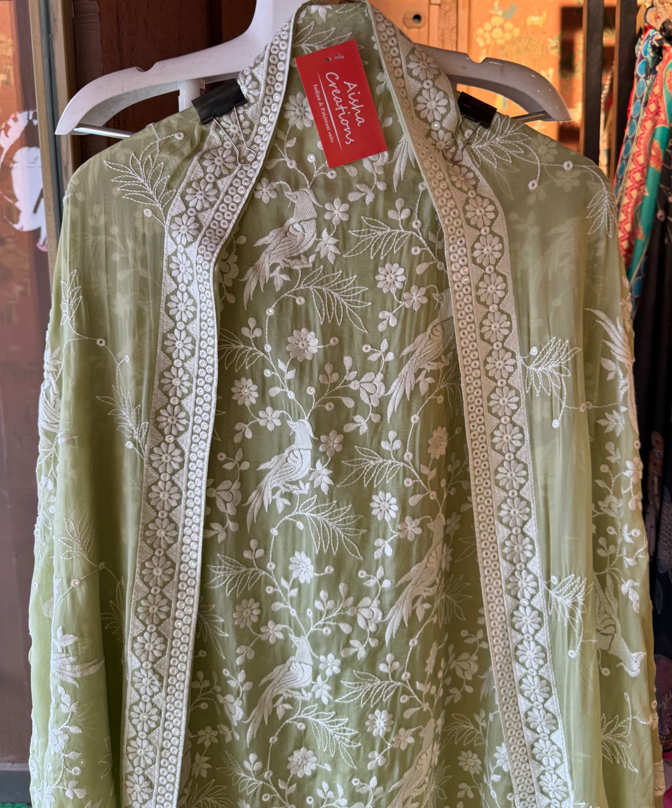 Very beautifully thread work done with sequence highlighting on the shirt front