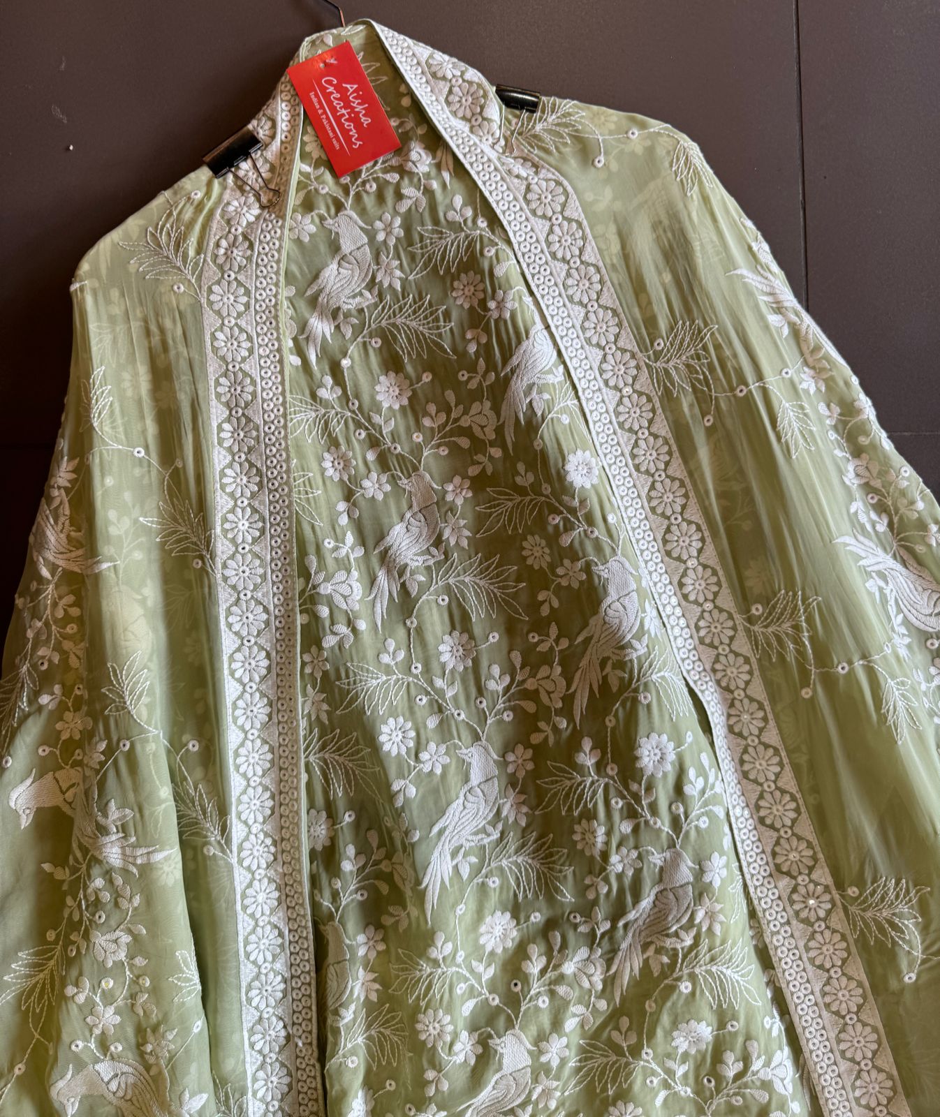 Very beautifully thread work done with sequence highlighting on the shirt front