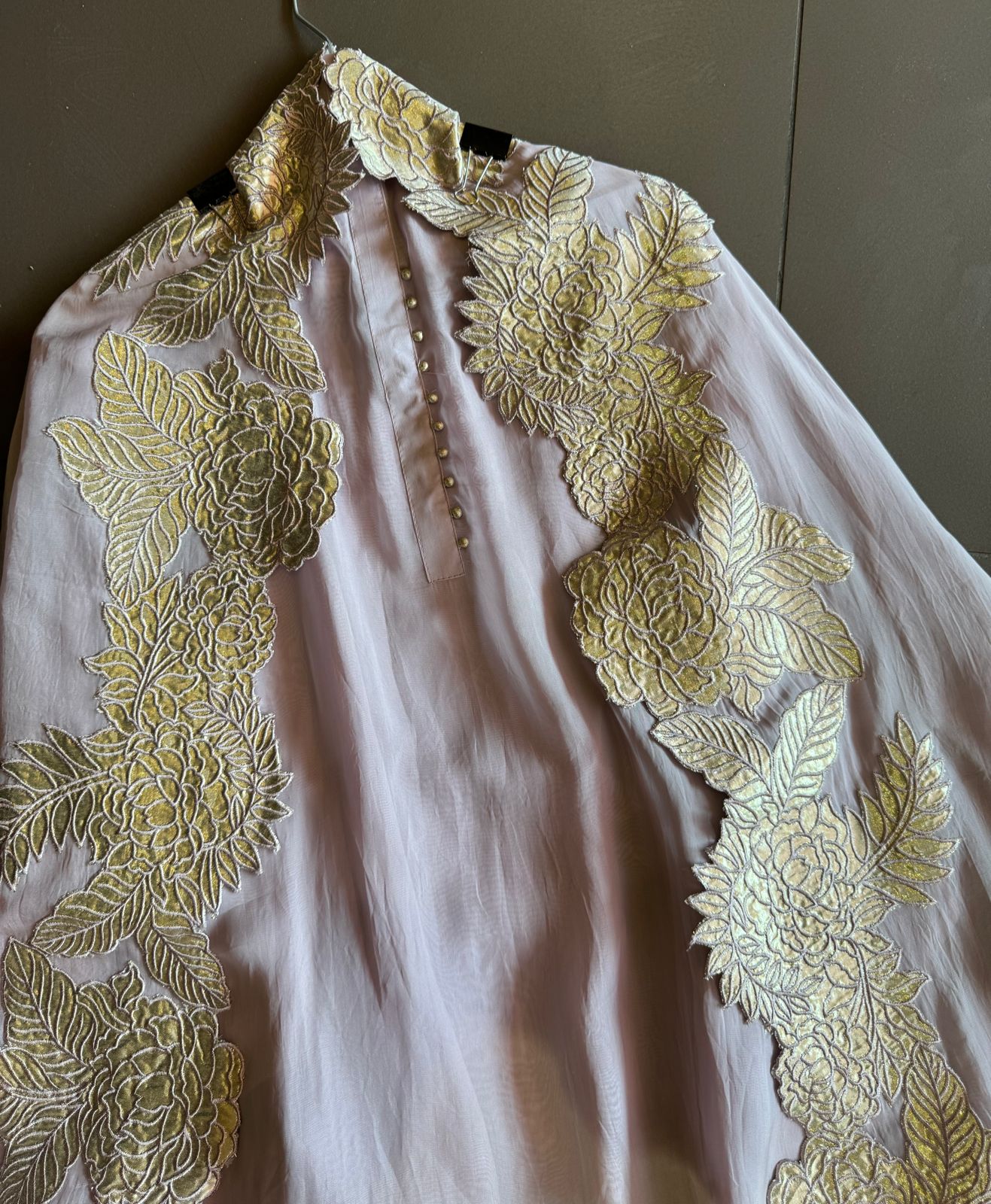 Super soft and Flowy organza with beautiful cushioning pattern on the shirt ghera and button detailings on the neckline