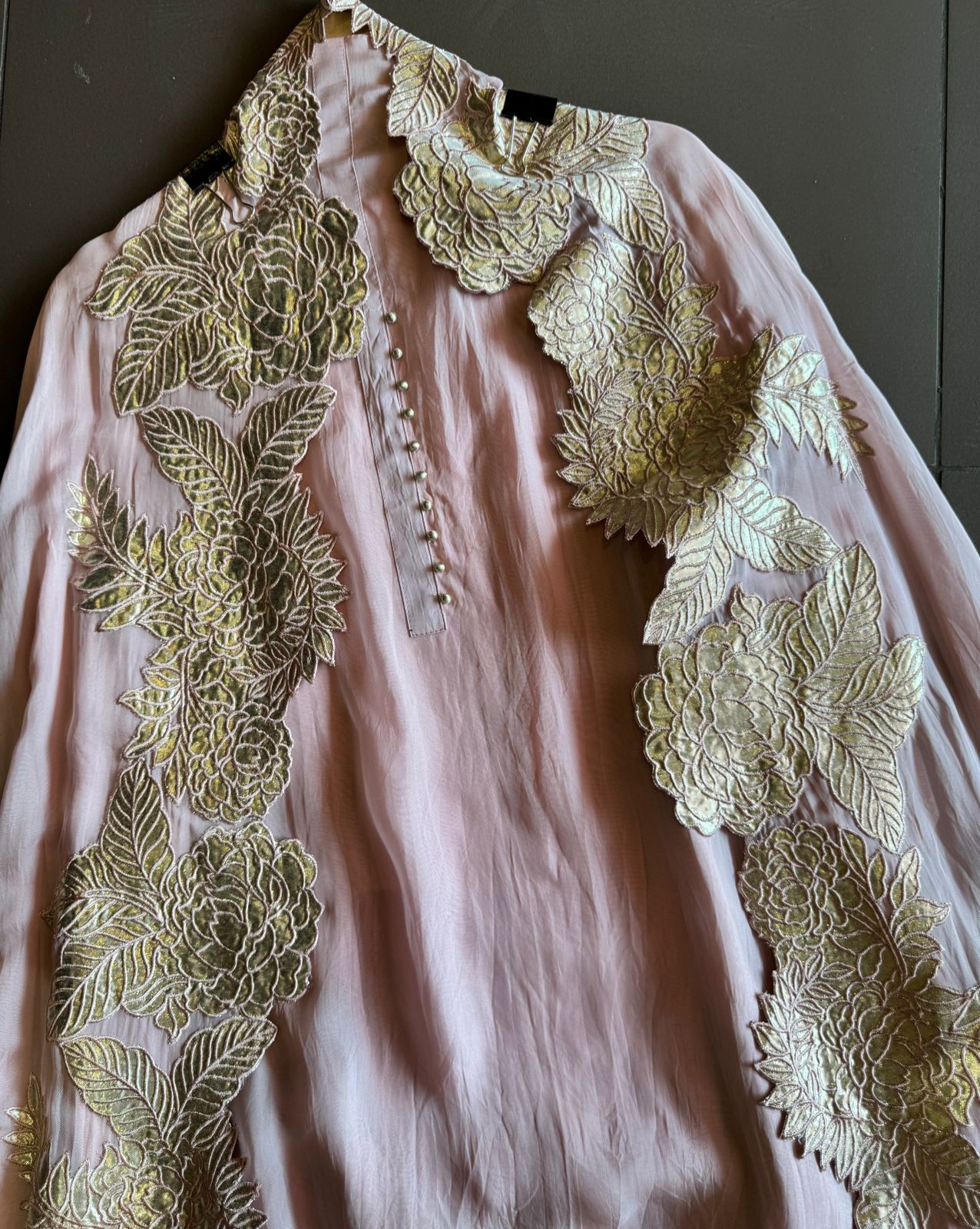 Super soft and Flowy organza with beautiful cushioning pattern on the shirt ghera and button detailings on the neckline
