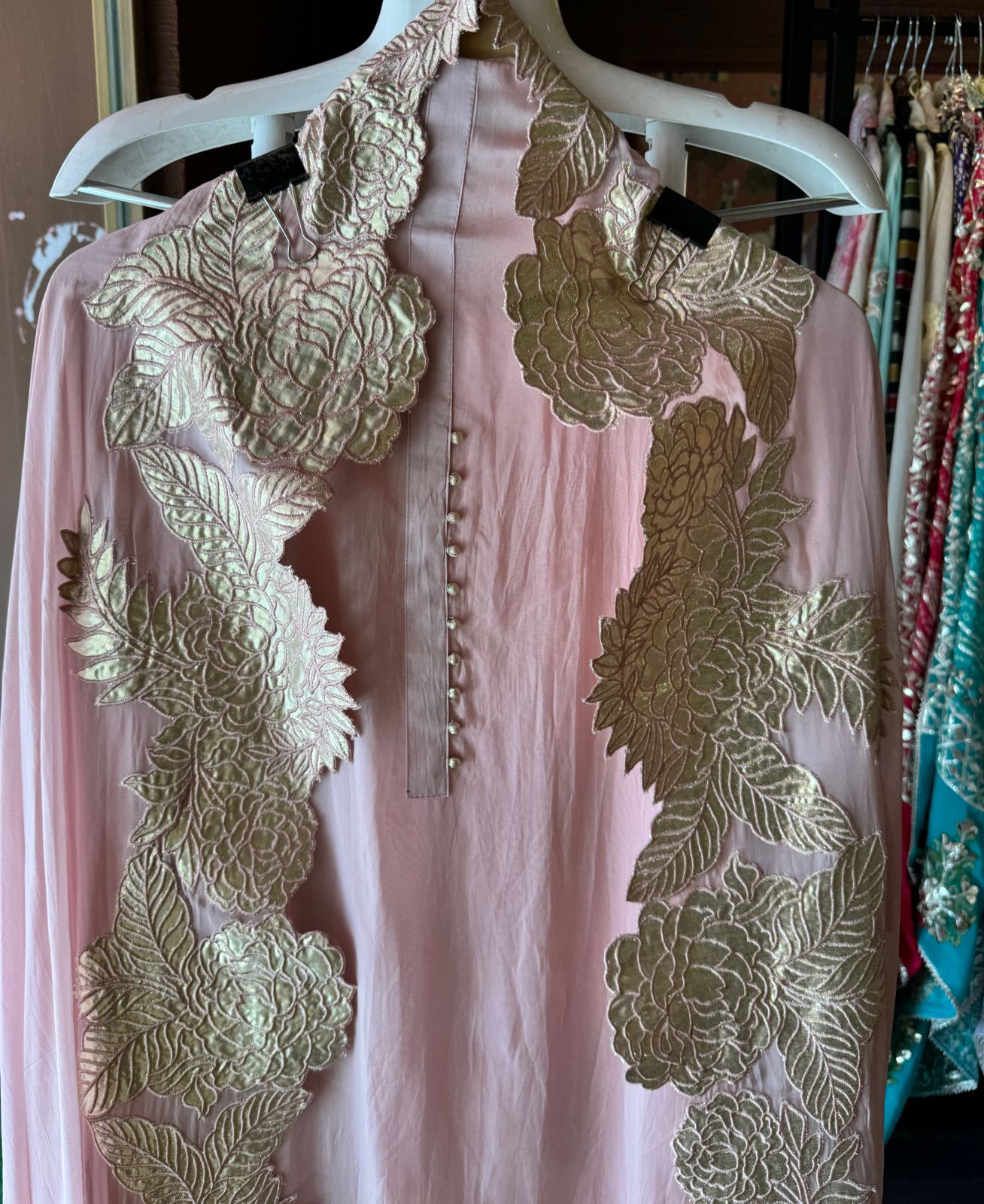 Super soft and Flowy organza with beautiful cushioning pattern on the shirt ghera and button detailings on the neckline