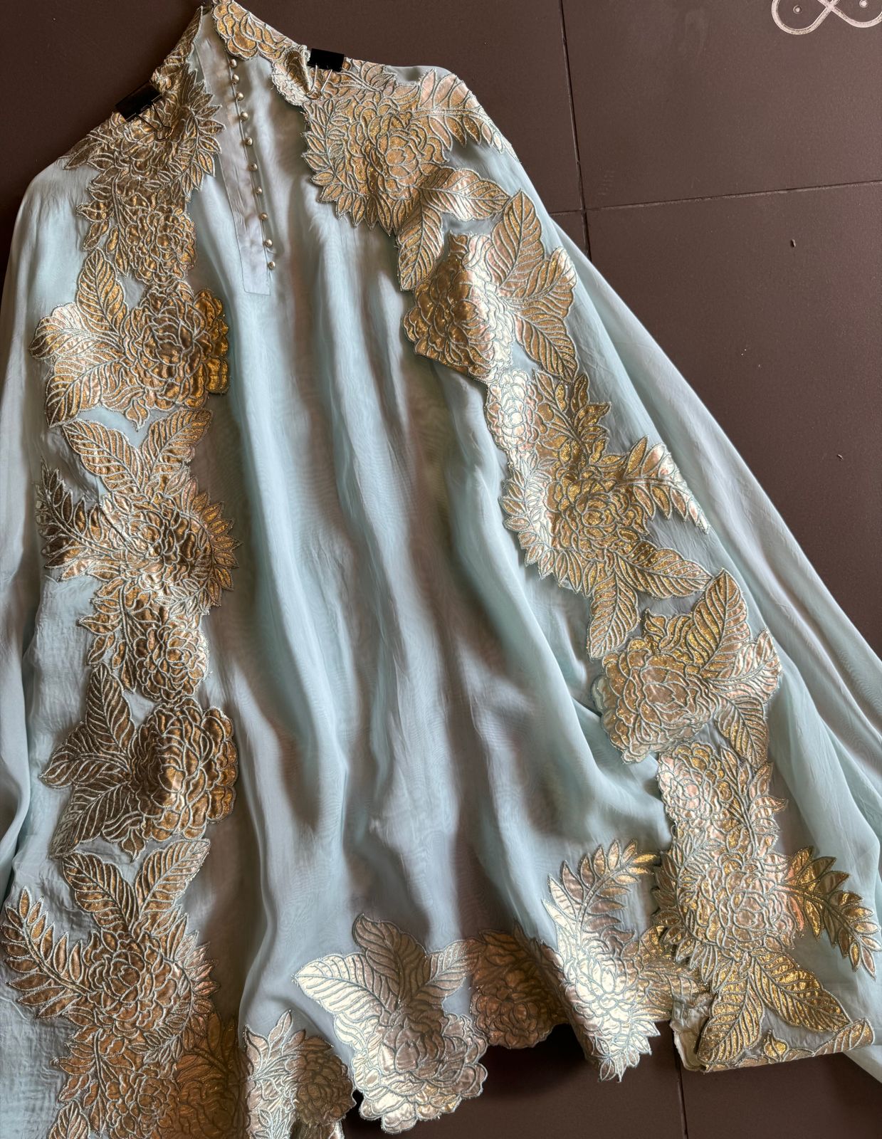 Super soft and Flowy organza with beautiful cushioning pattern on the shirt ghera and button detailings on the neckline