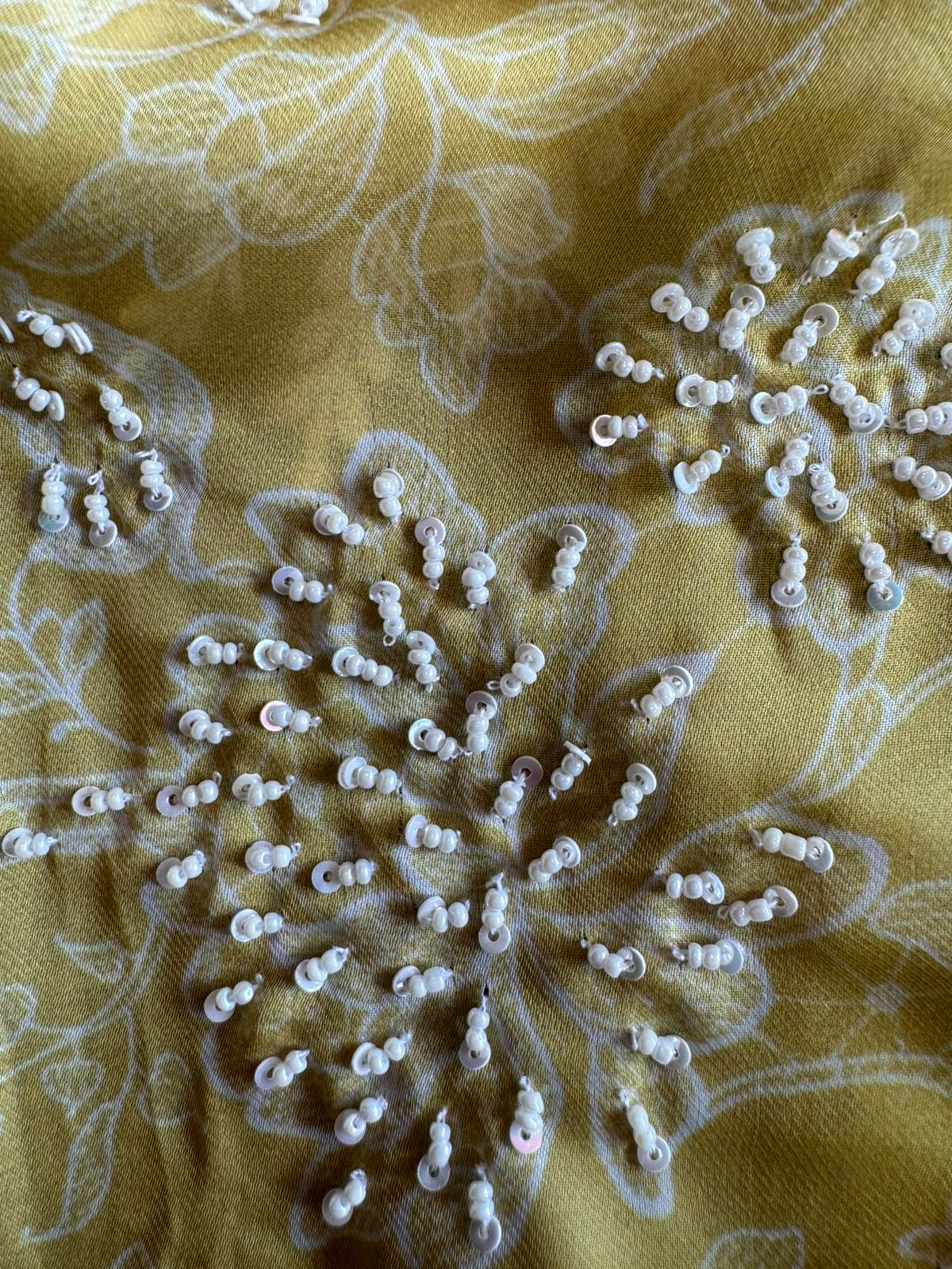 Soft satin crepe full size unstitched Shirt with very beautiful Neckline with nalki embellishments.