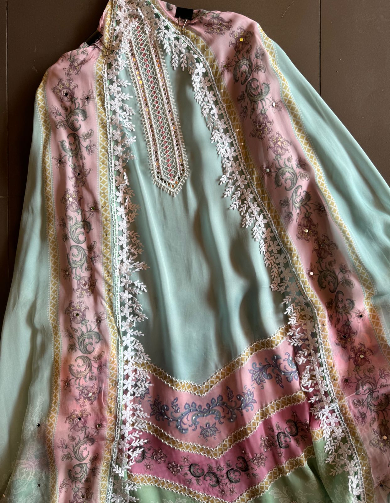 Soft satin crepe full size unstitched Shirt with very beautiful Neckline with nalki embellishments.