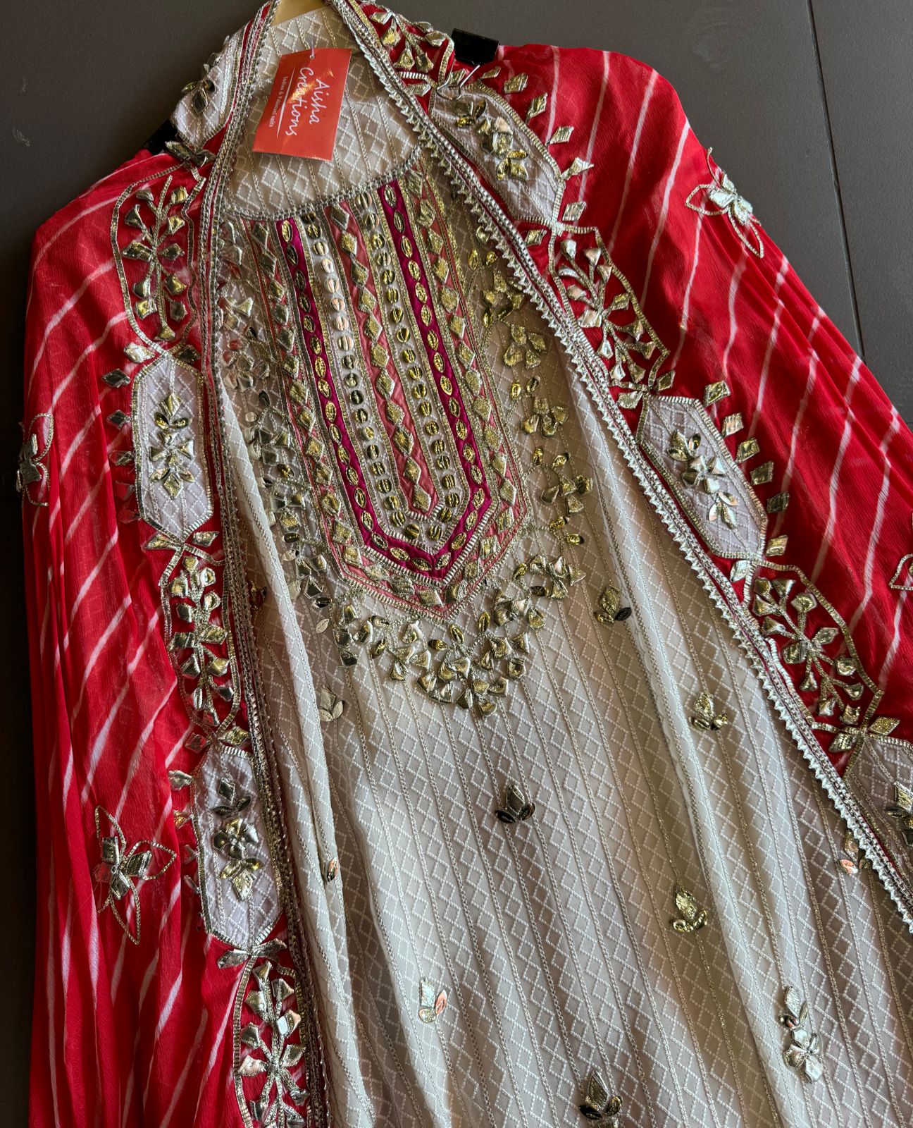 Pure Georgette Self embroidered shirt with heavy gotta Patti work done on the neckline