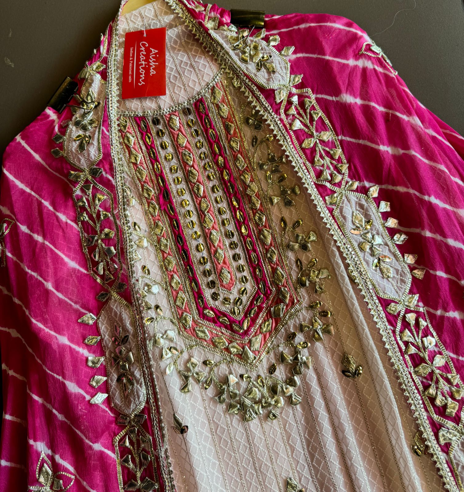 Pure Georgette Self embroidered shirt with heavy gotta Patti work done on the neckline