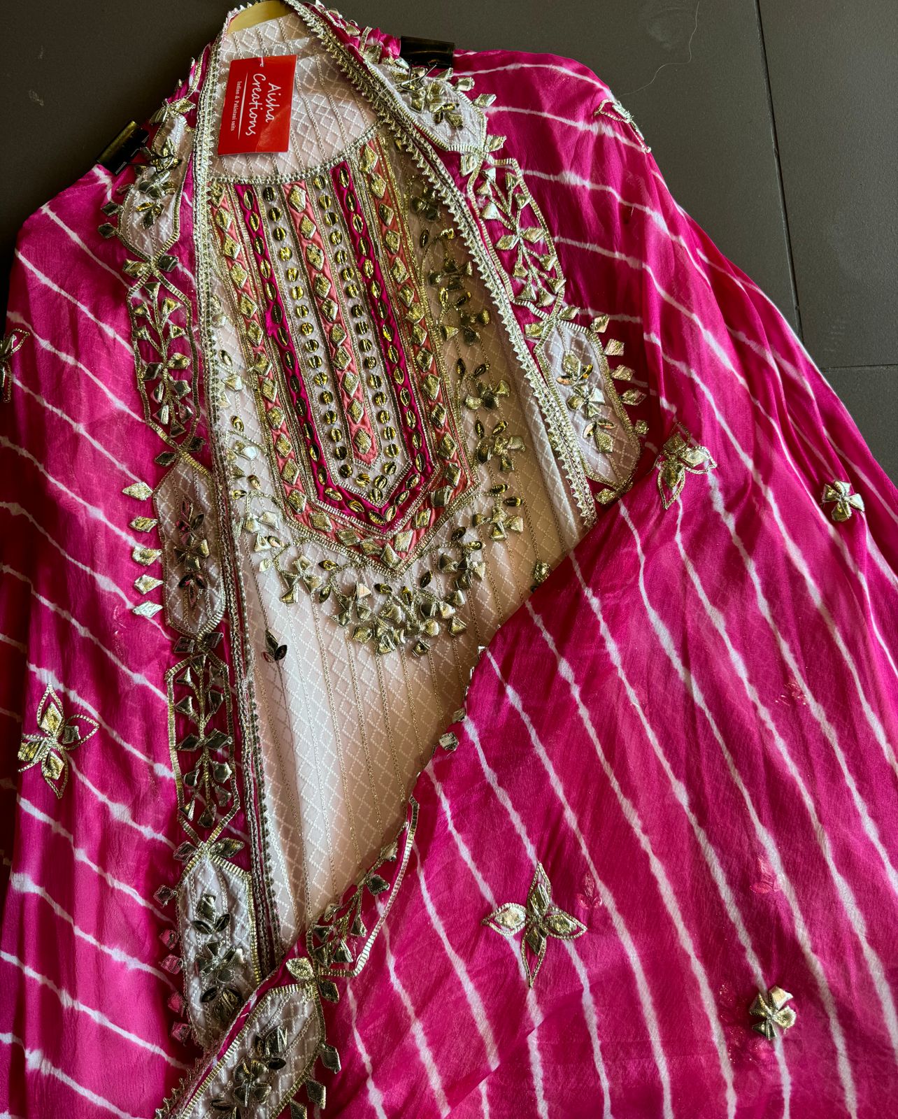 Pure Georgette Self embroidered shirt with heavy gotta Patti work done on the neckline