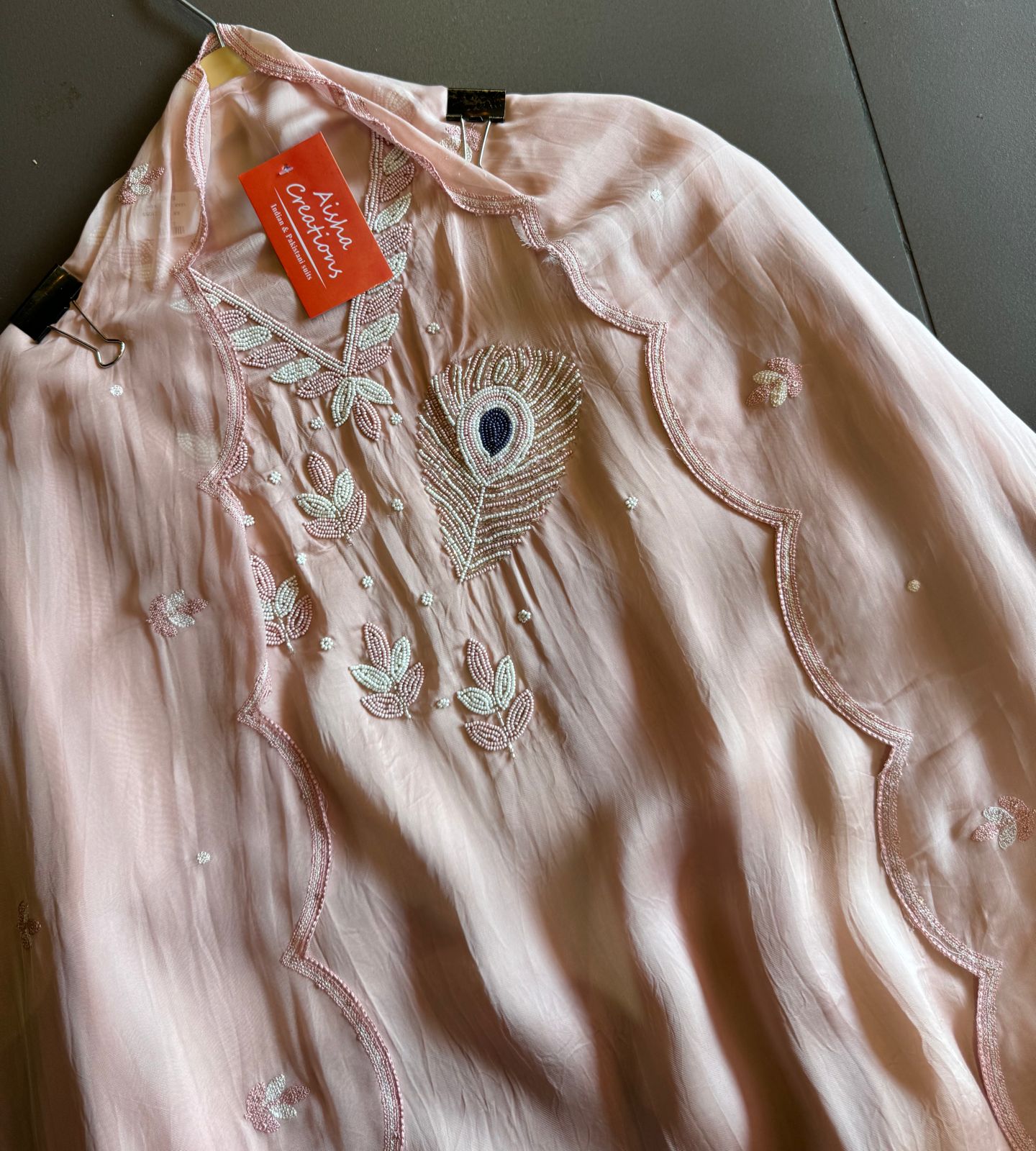 Soft organza Shirt with beautiful handwork highlighting on the neck front with Moti work