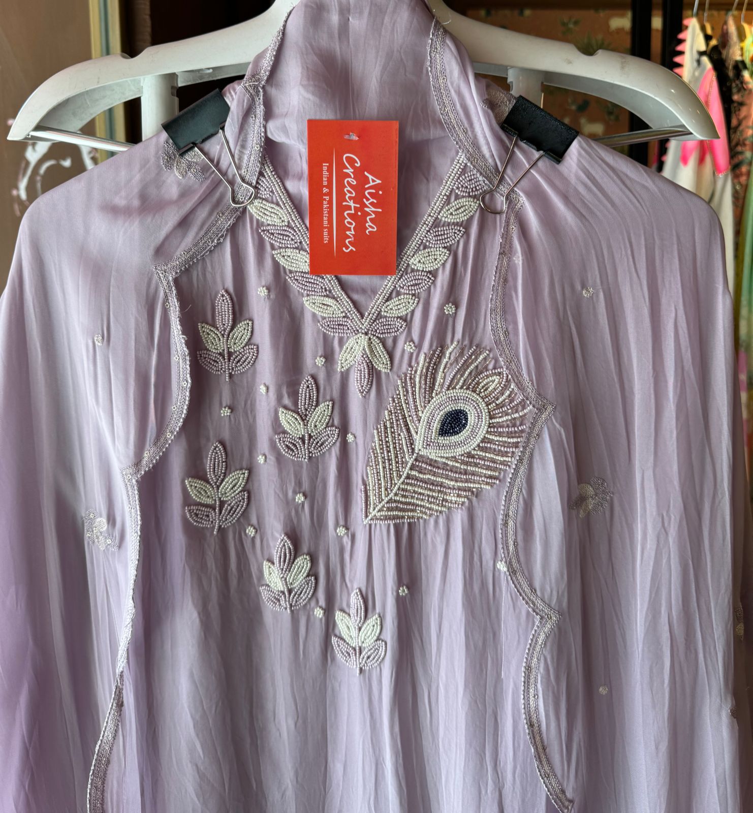Soft organza Shirt with beautiful handwork highlighting on the neck front with Moti work