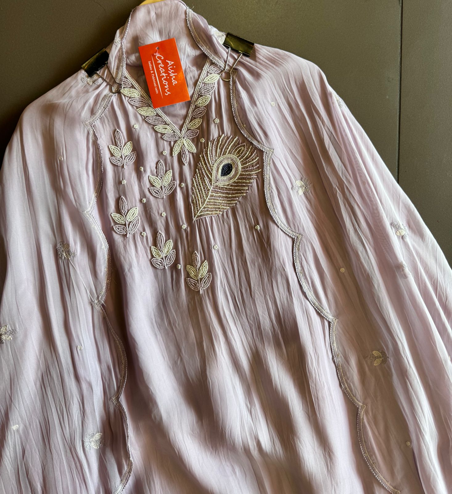 Soft organza Shirt with beautiful handwork highlighting on the neck front with Moti work