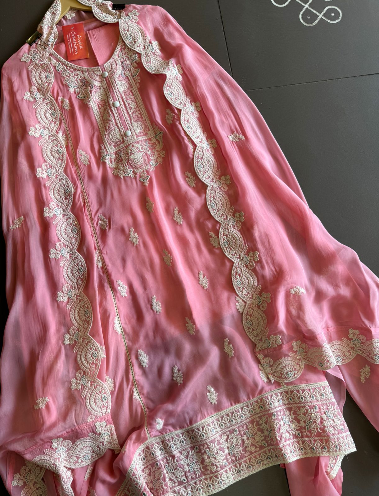 Soft organza Unstitched shirt with designer Threadwork booties and Even on the sides of the shirt