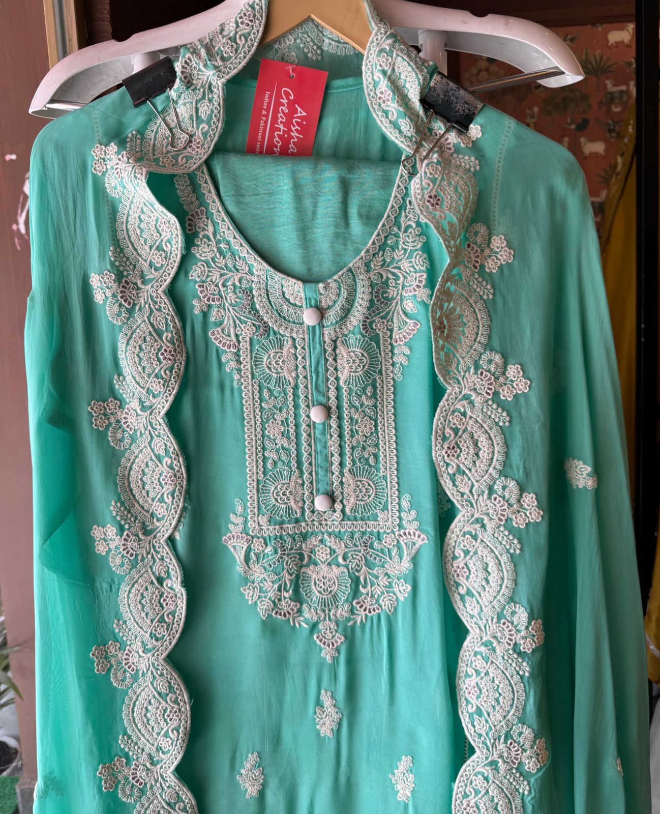 Soft organza Unstitched shirt with designer Threadwork booties and Even on the sides of the shirt