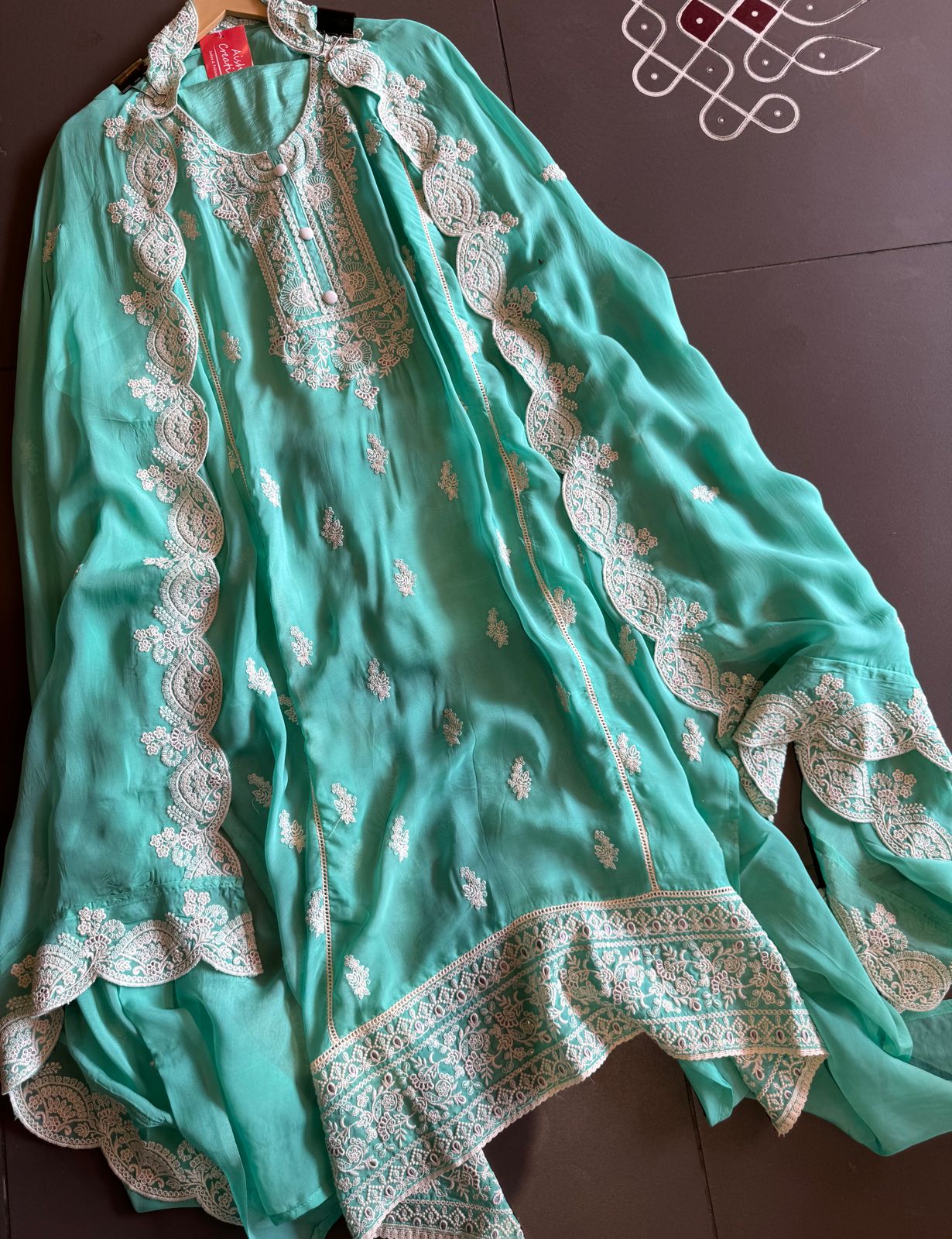 Soft organza Unstitched shirt with designer Threadwork booties and Even on the sides of the shirt