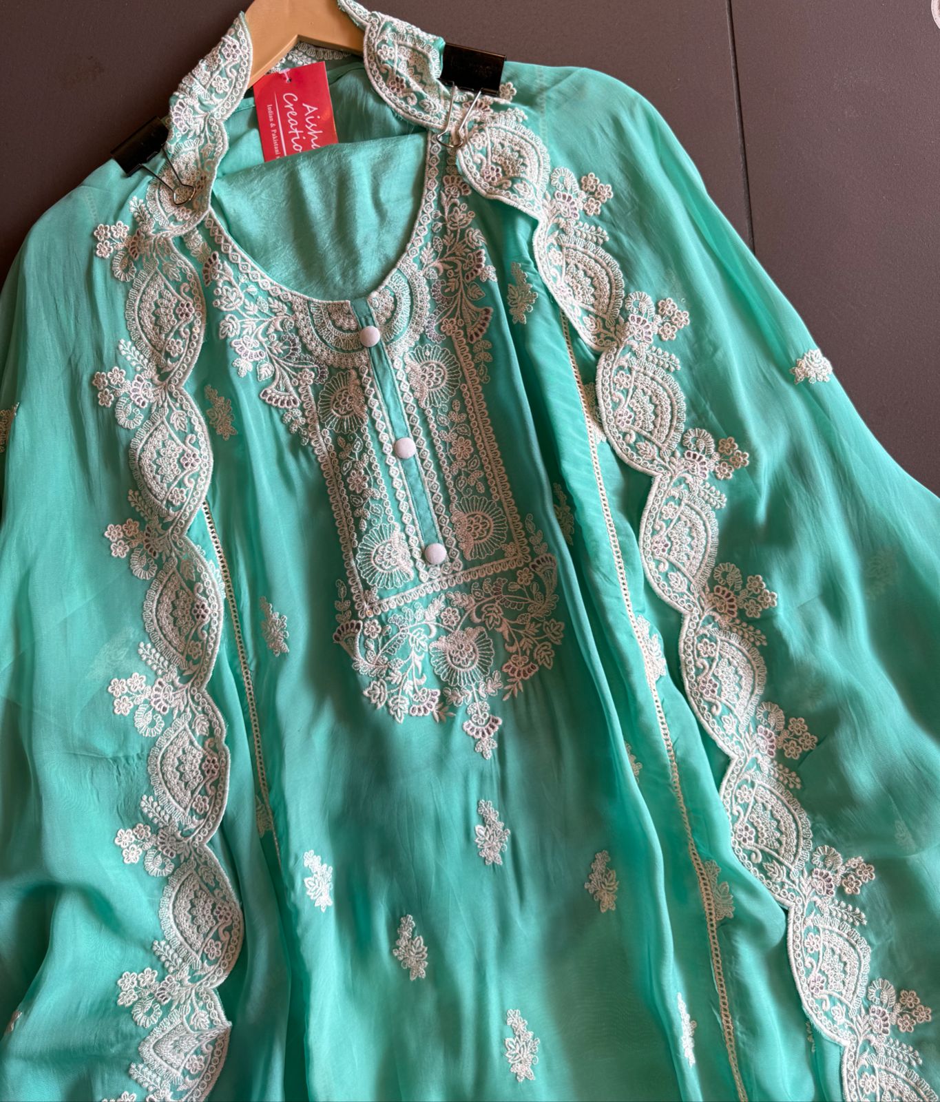 Soft organza Unstitched shirt with designer Threadwork booties and Even on the sides of the shirt