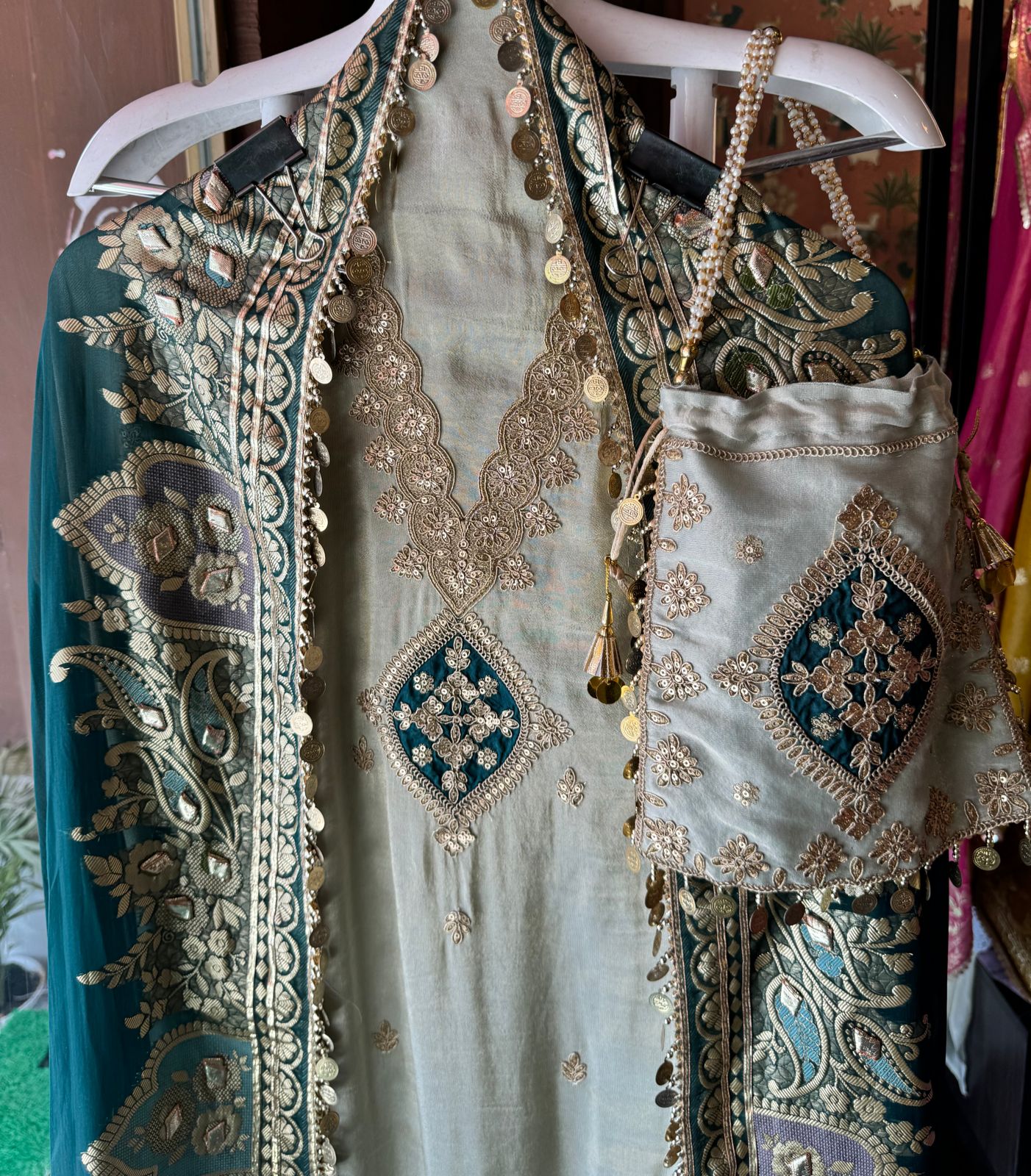 Pure organza silk zari weaving booties unstitched Shirt with very gorgeous neckline made from Dori zari and dabka work