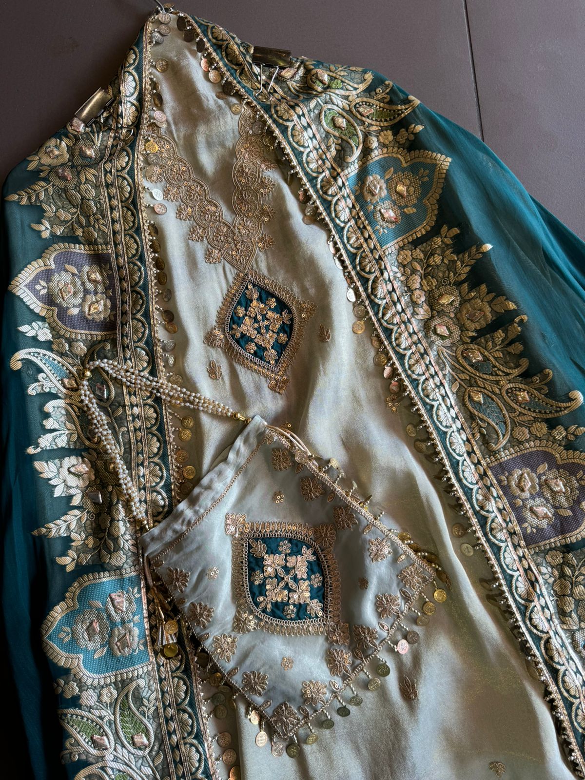 Pure organza silk zari weaving booties unstitched Shirt with very gorgeous neckline made from Dori zari and dabka work