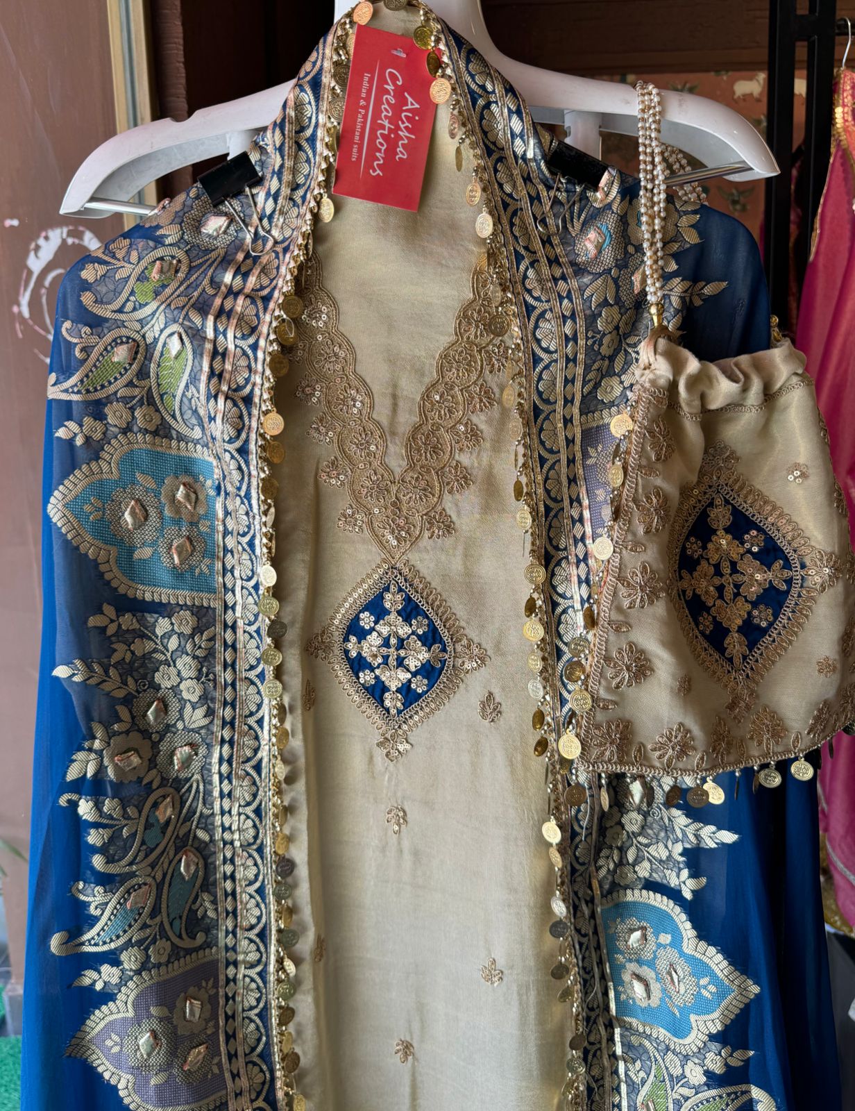 Pure organza silk zari weaving booties unstitched Shirt with very gorgeous neckline made from Dori zari and dabka work