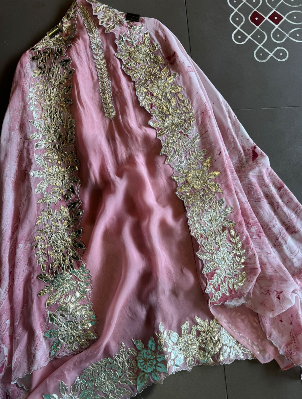 Plain shirt with neck Patti design and Cutwork done on the ghera of the shirt (Foil with dori work)