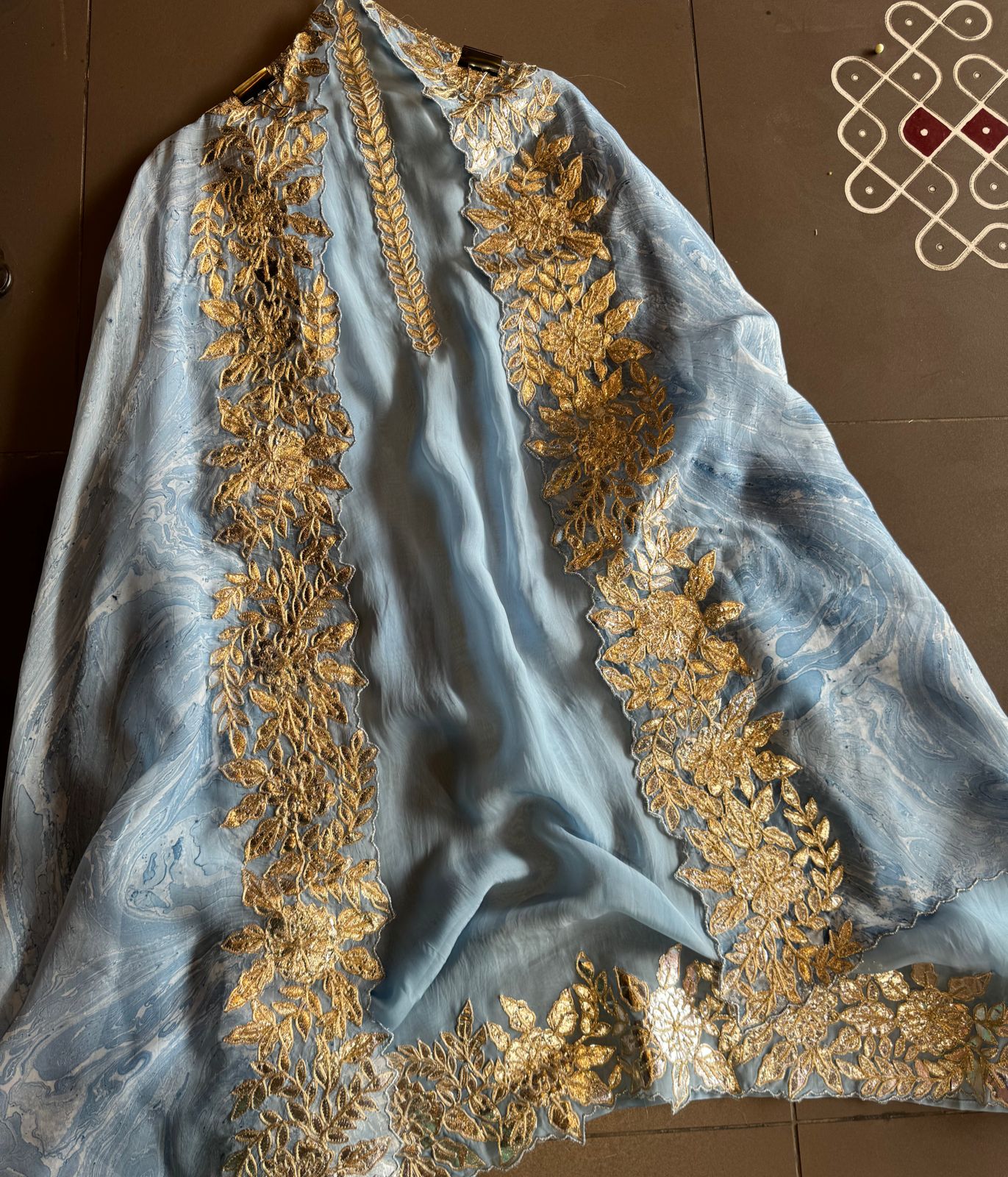 Plain shirt with neck Patti design and Cutwork done on the ghera of the shirt (Foil with dori work)