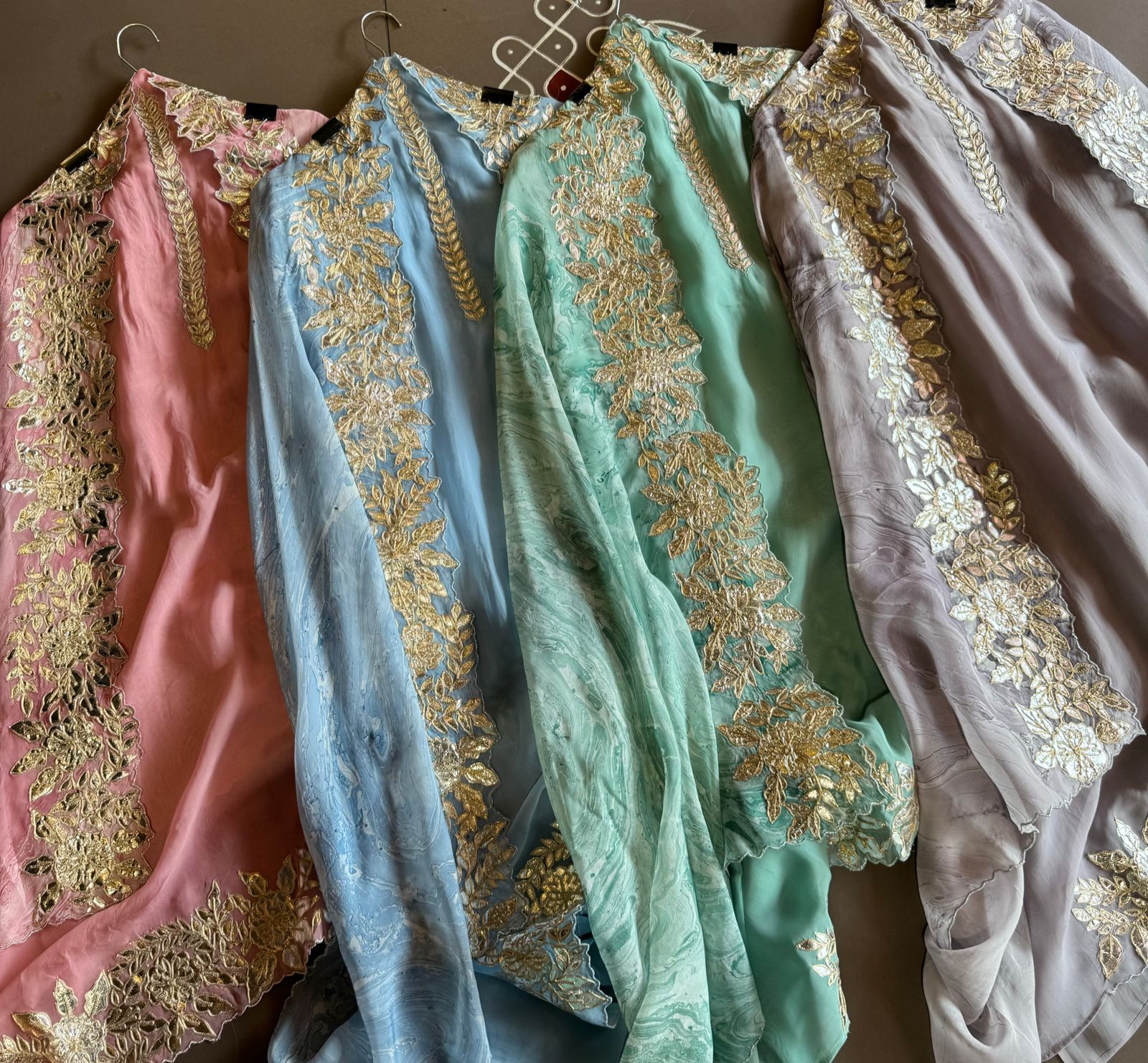 Plain shirt with neck Patti design and Cutwork done on the ghera of the shirt (Foil with dori work)