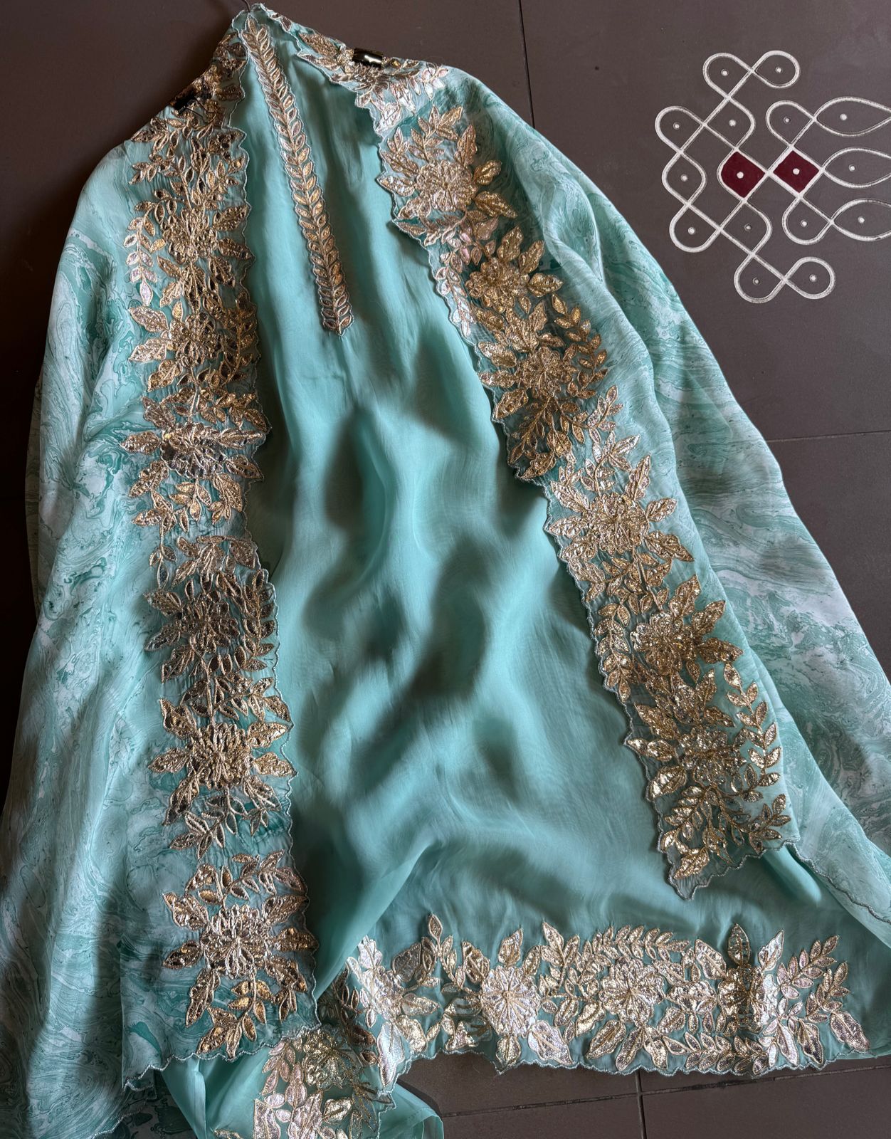 Plain shirt with neck Patti design and Cutwork done on the ghera of the shirt (Foil with dori work)