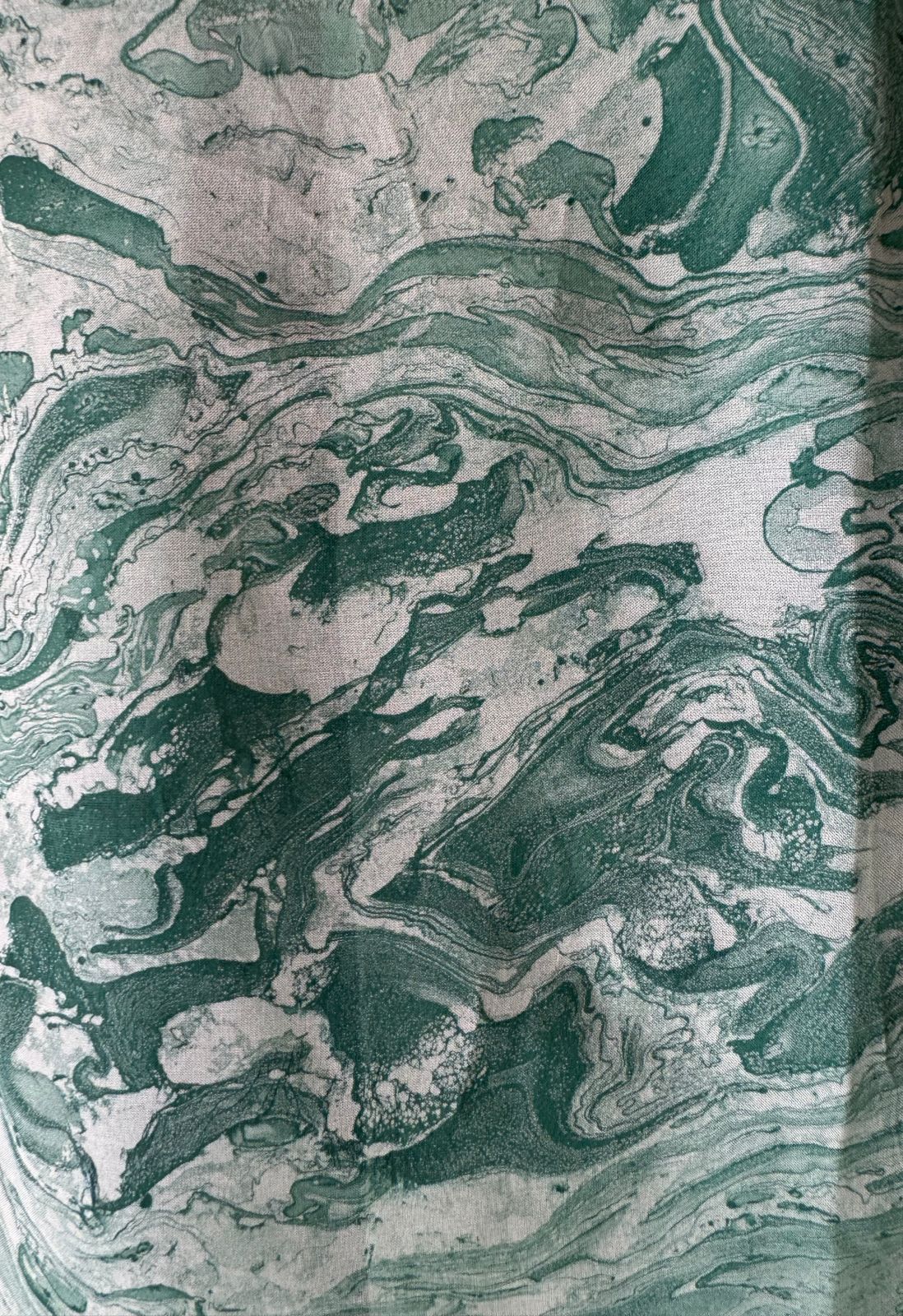 Plain shirt with neck Patti design and Cutwork done on the ghera of the shirt (Foil with dori work)