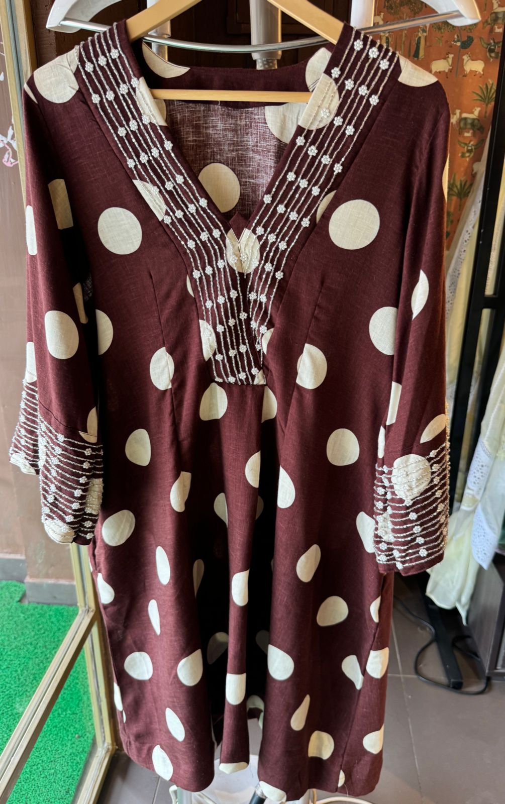 Pure linen cotton Polka dots set very smart and Elegant concept with nalki embellishments on the sleeves and neckline as well.