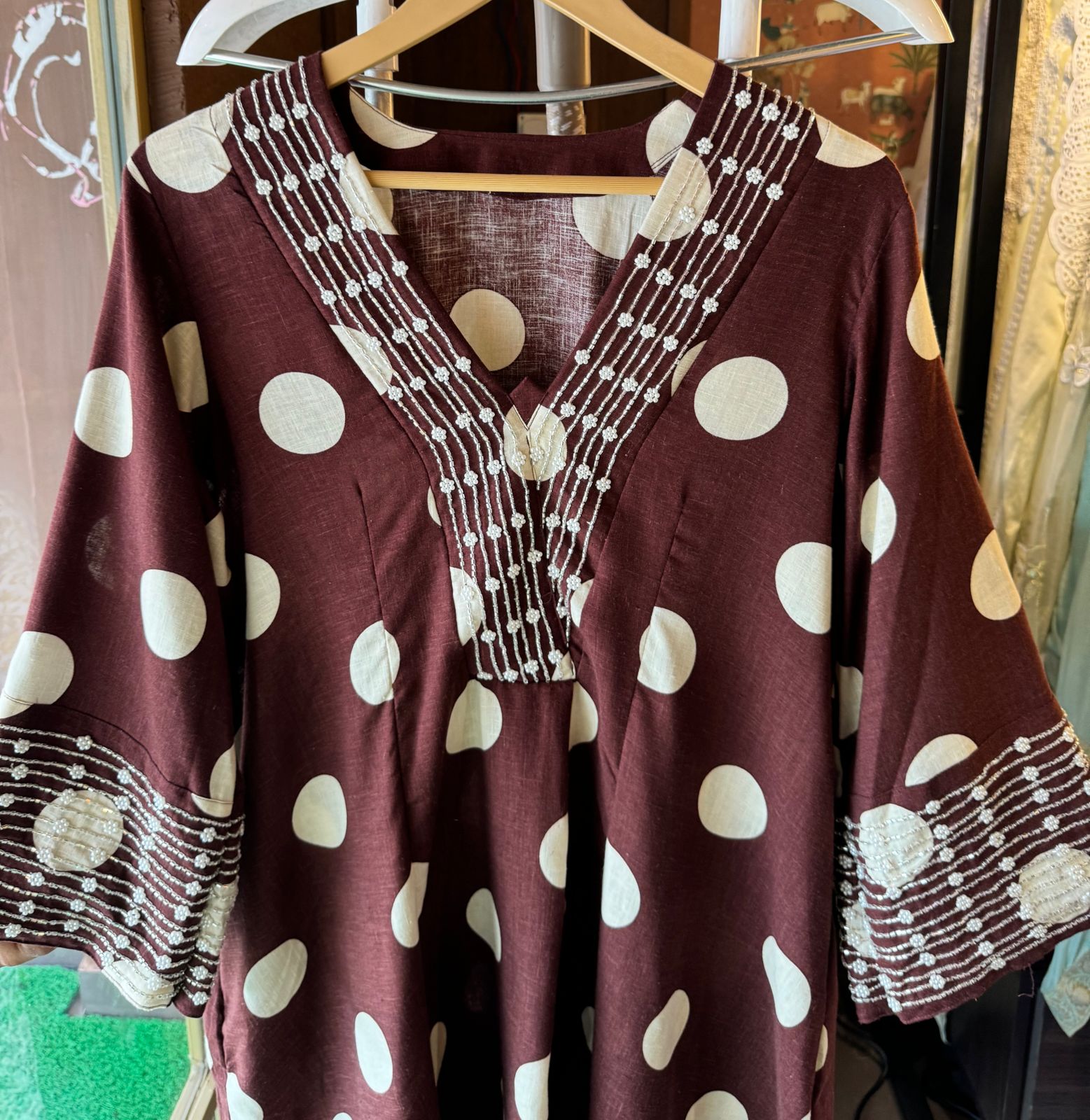 Pure linen cotton Polka dots set very smart and Elegant concept with nalki embellishments on the sleeves and neckline as well.