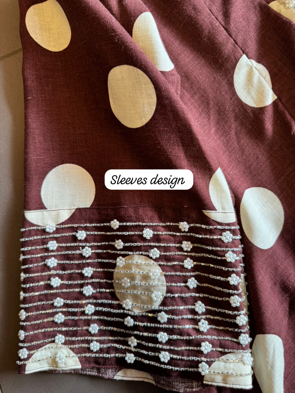 Pure linen cotton Polka dots set very smart and Elegant concept with nalki embellishments on the sleeves and neckline as well.