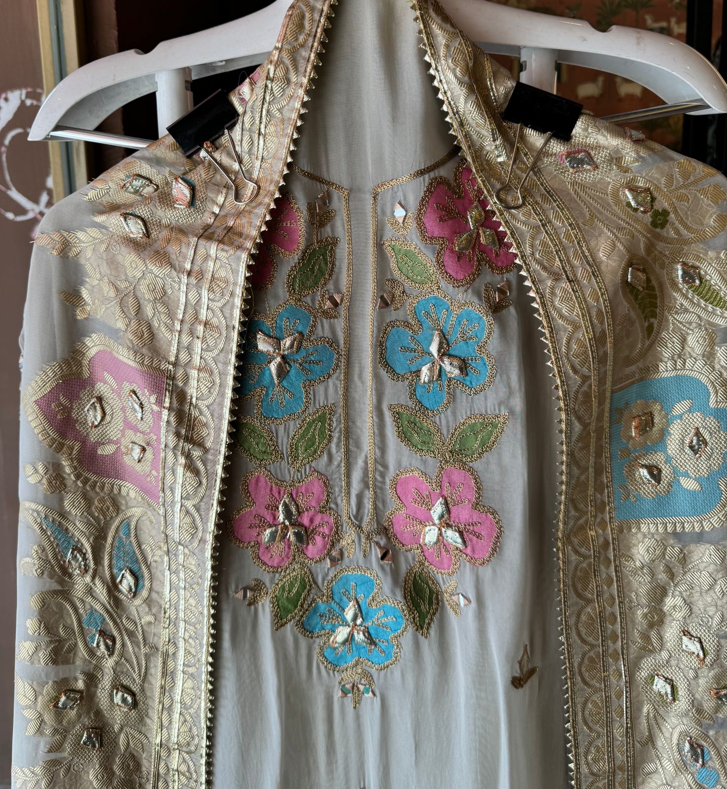 Soft organza Shirt unstitched Shirt with floral shimmer handcraft patchwork And zari Kadhai on it.