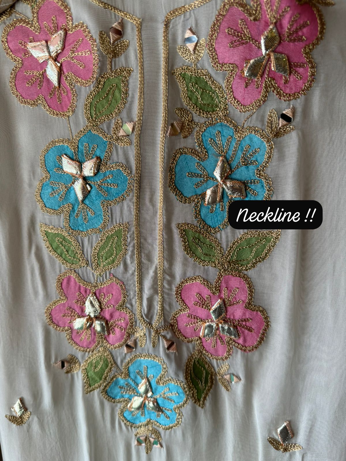 Soft organza Shirt unstitched Shirt with floral shimmer handcraft patchwork And zari Kadhai on it.