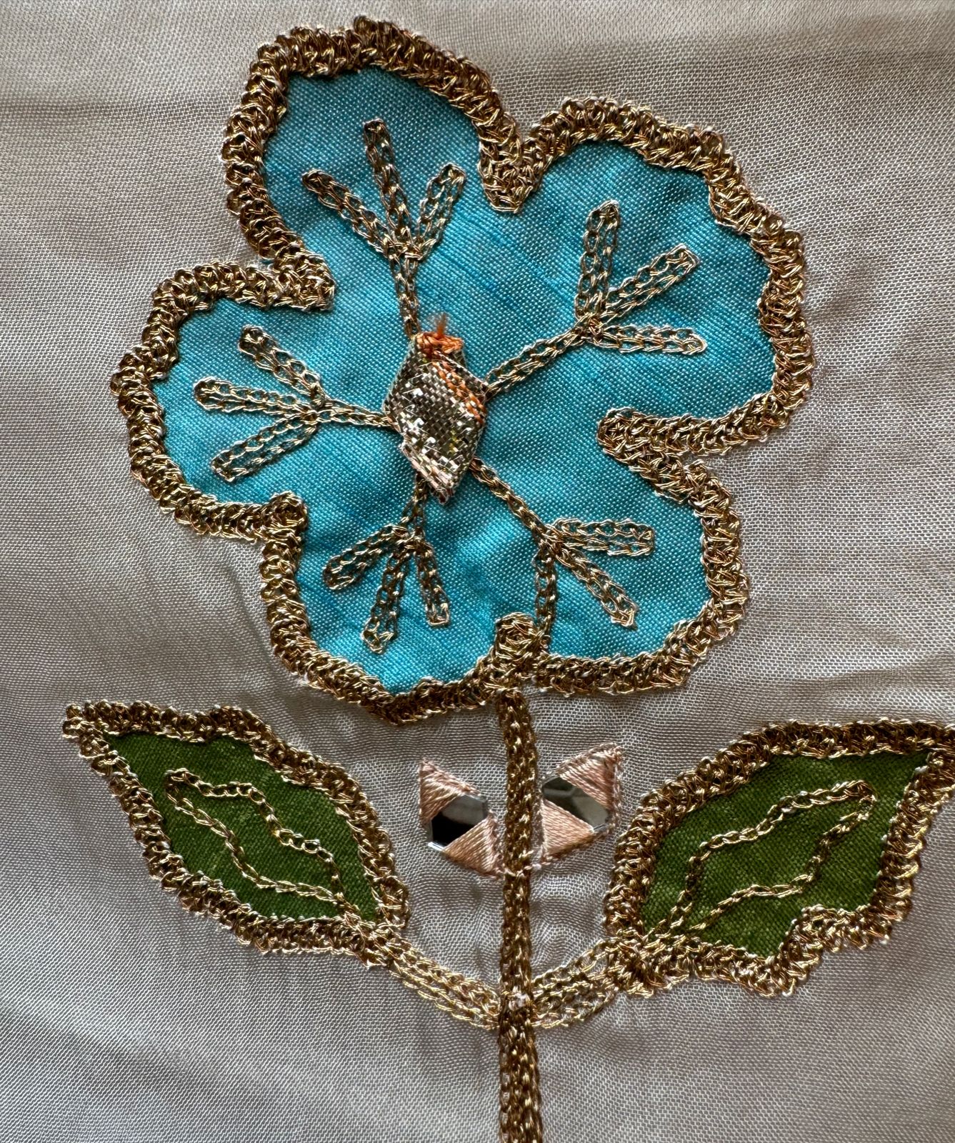 Soft organza Shirt unstitched Shirt with floral shimmer handcraft patchwork And zari Kadhai on it.